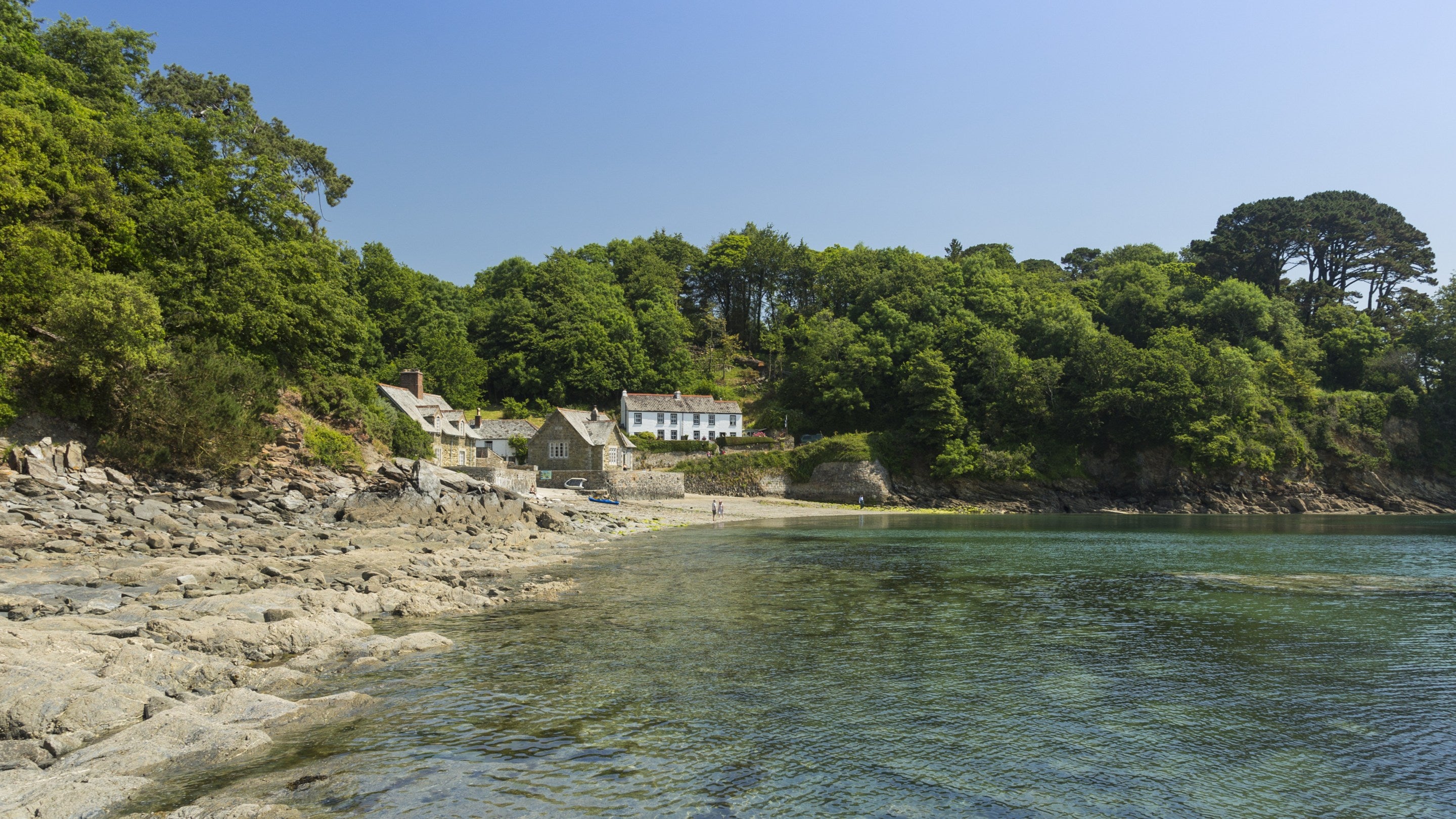 Holiday cottages on the beach near Glendurgan Garden, Cornwall