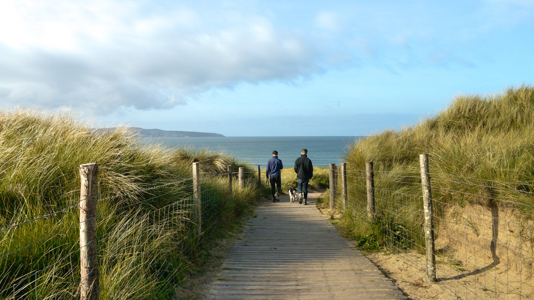Walking down the boardwalk at Godrevy