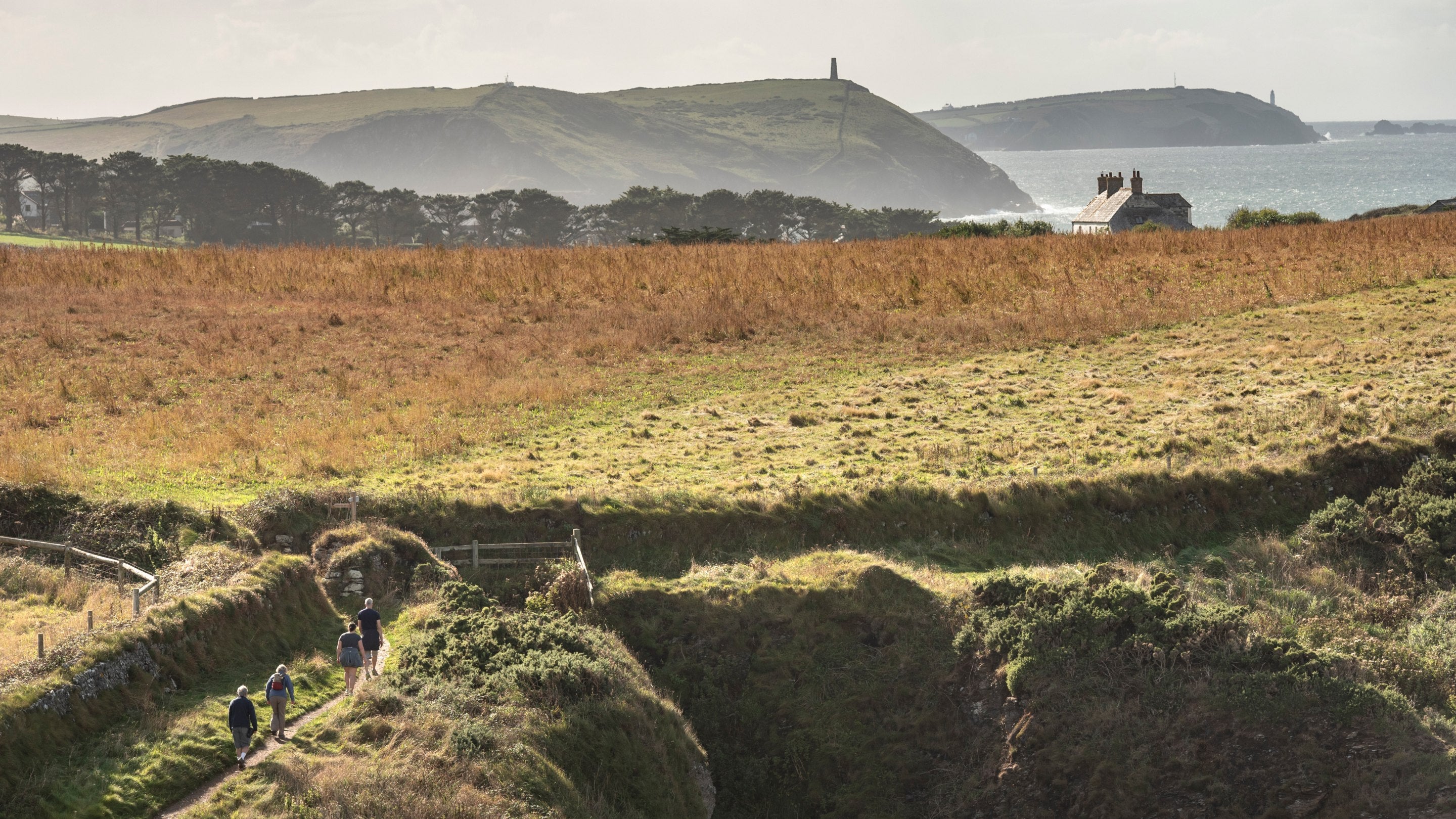 Exploring the South West Coast path at Pentire, North Cornwall, in autumn