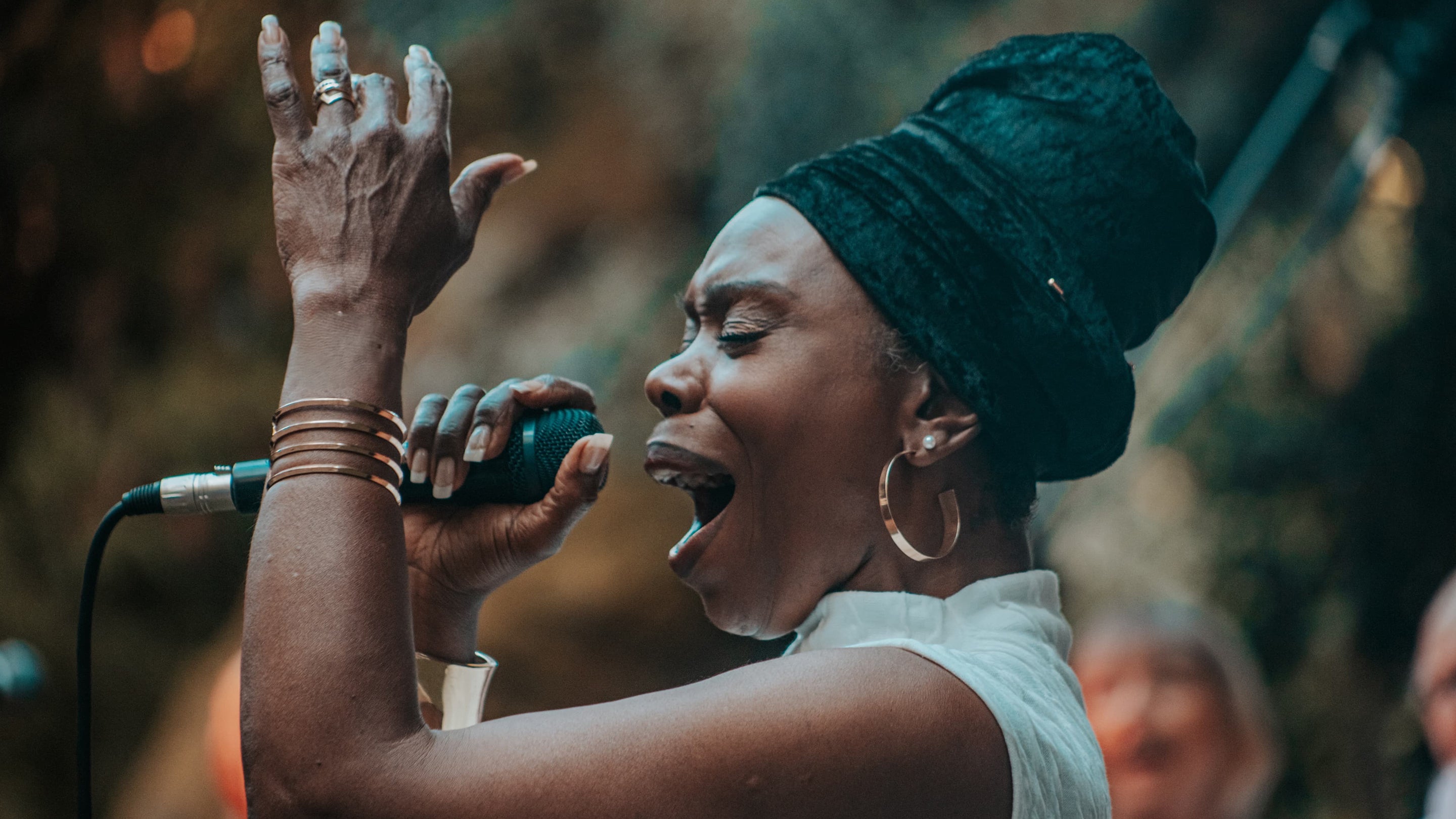 A woman performs in the Falmouth Community Gospel Choir
