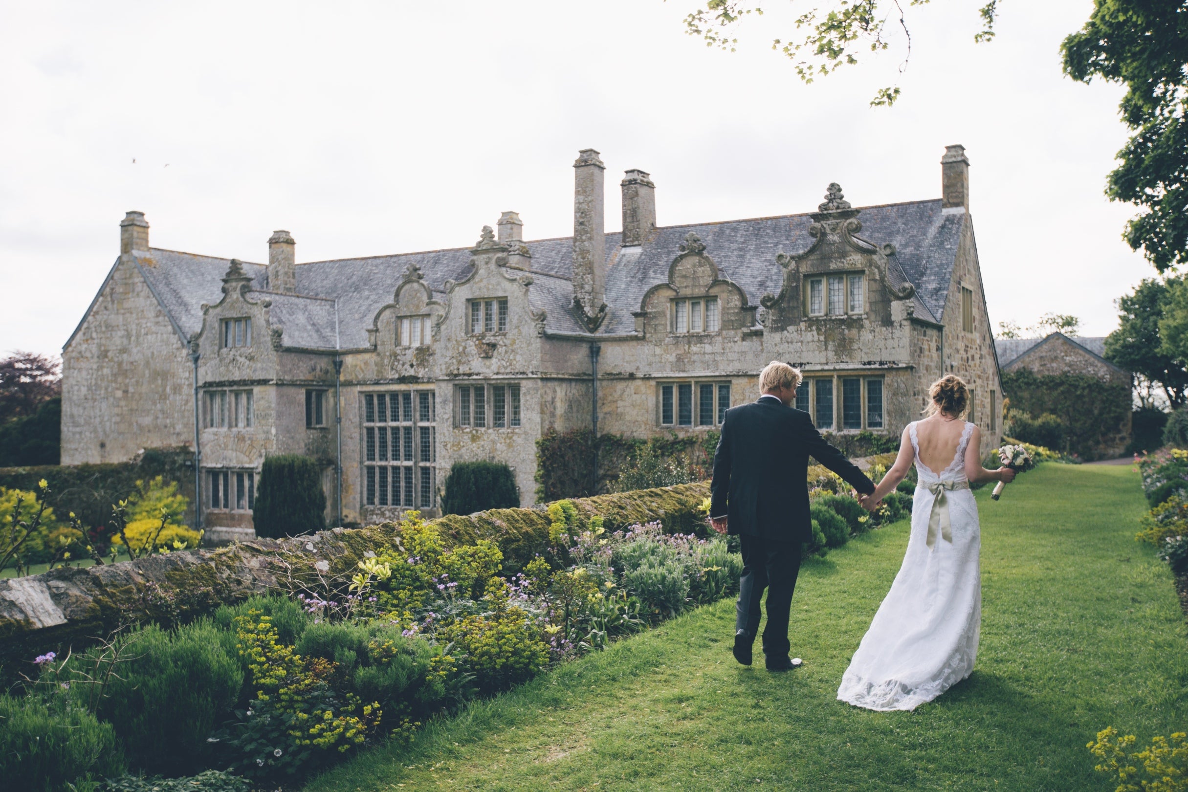 A couple on the long walk overlooking the house