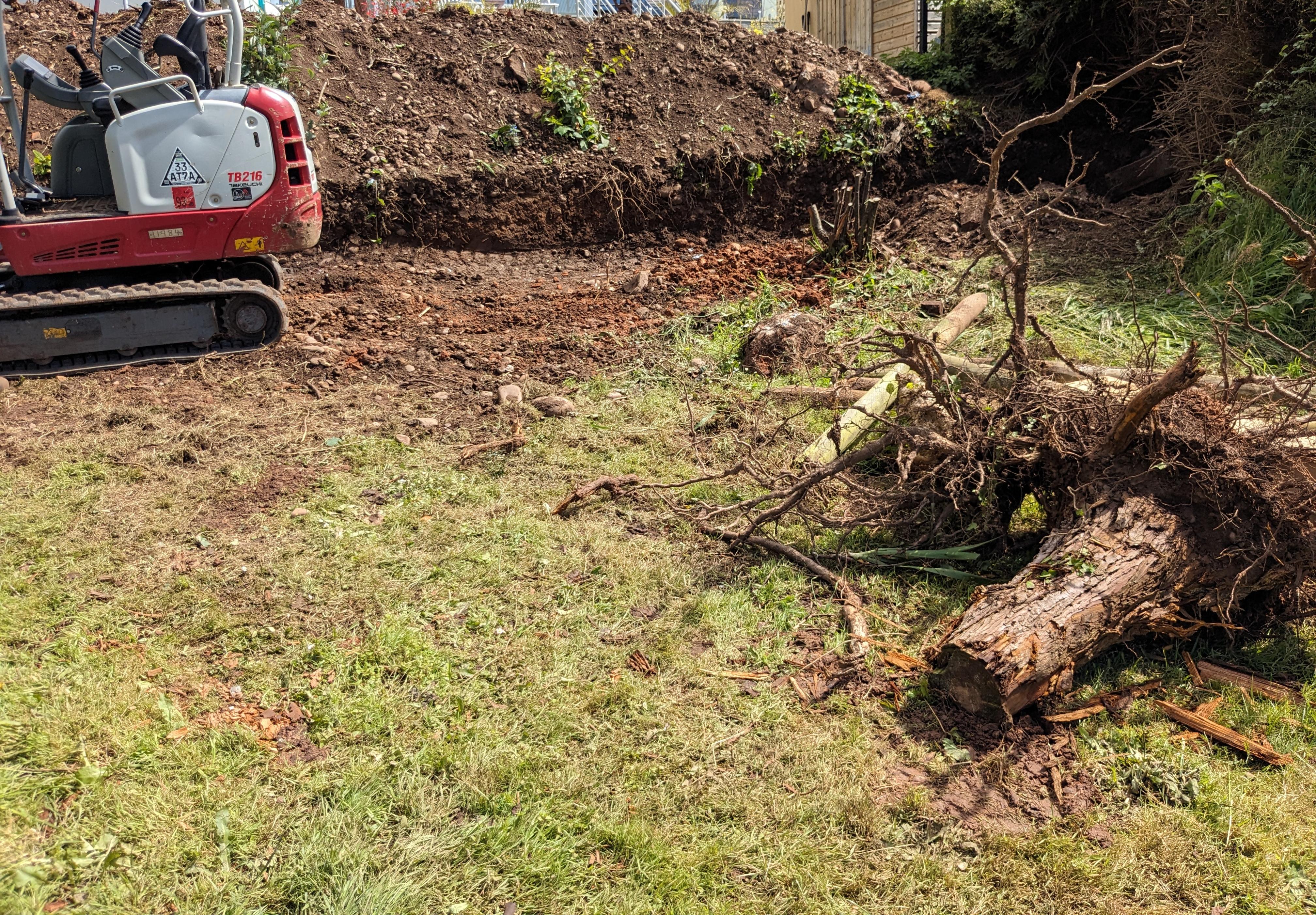 The far corner of the bee garden with  workers equipment