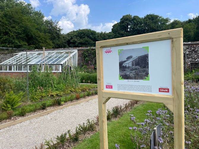 A photo panel showing the old glasshouse in front the the glass house today