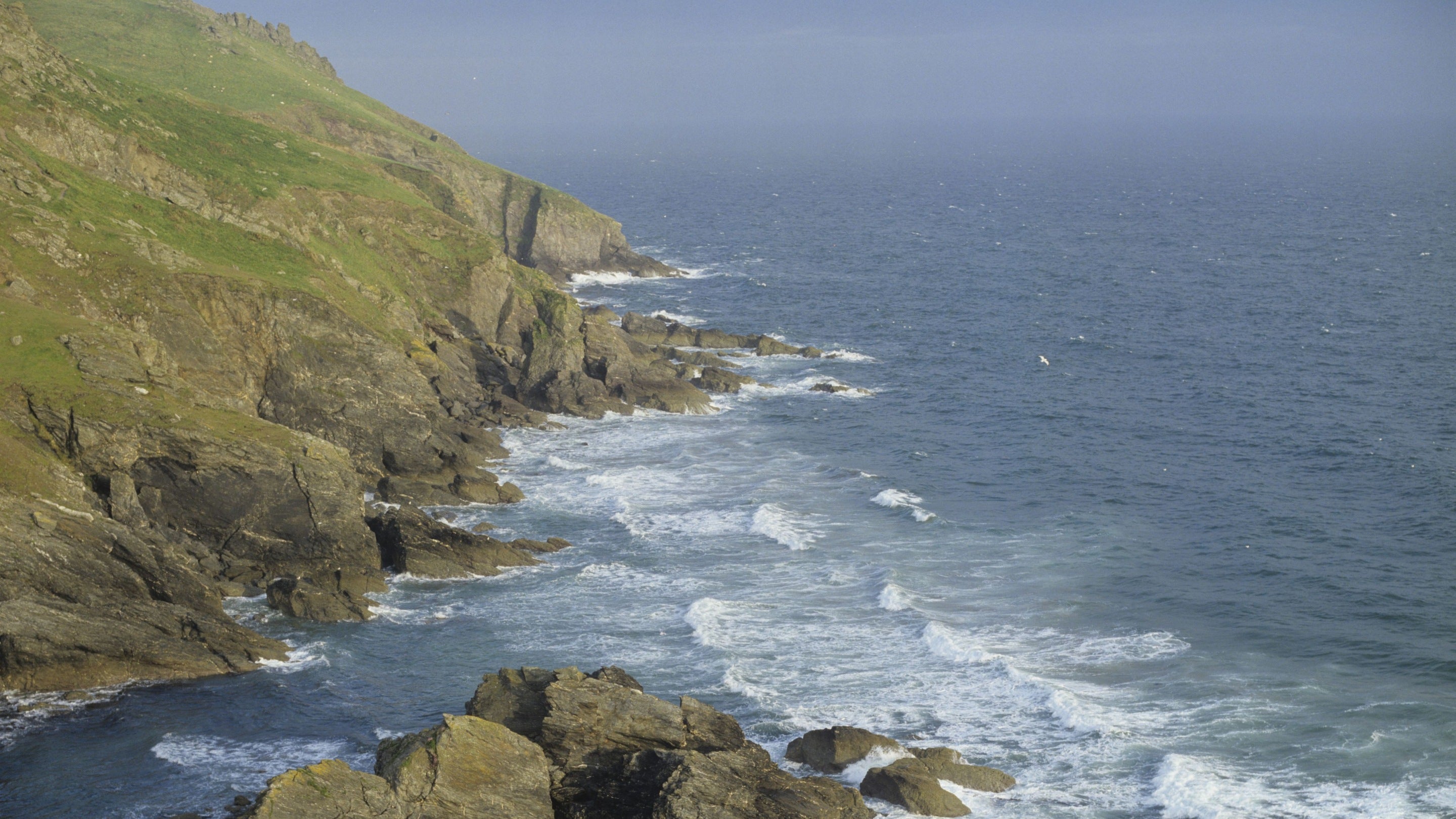 View of the rocky coastline, Bolt Head to Bolt Tail, showing breakers approaching Soar Mill Cove, Devon