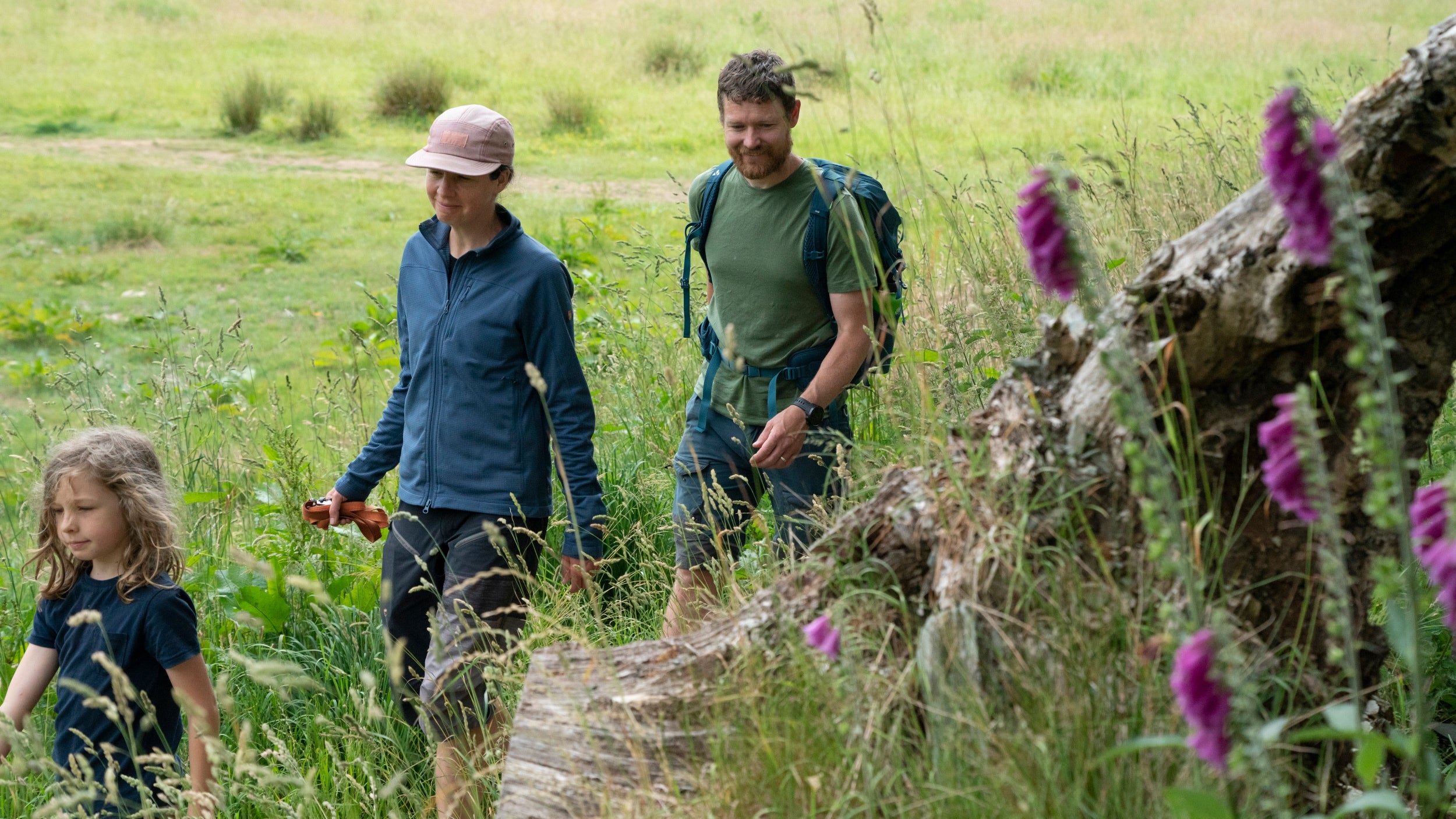 Family enjoying a walk in the fields at Branscombe