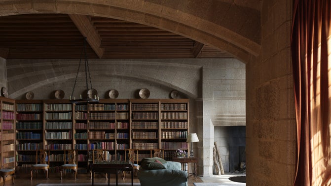 Library and Billiards Room looking at the large bookshelves from the billiards table.