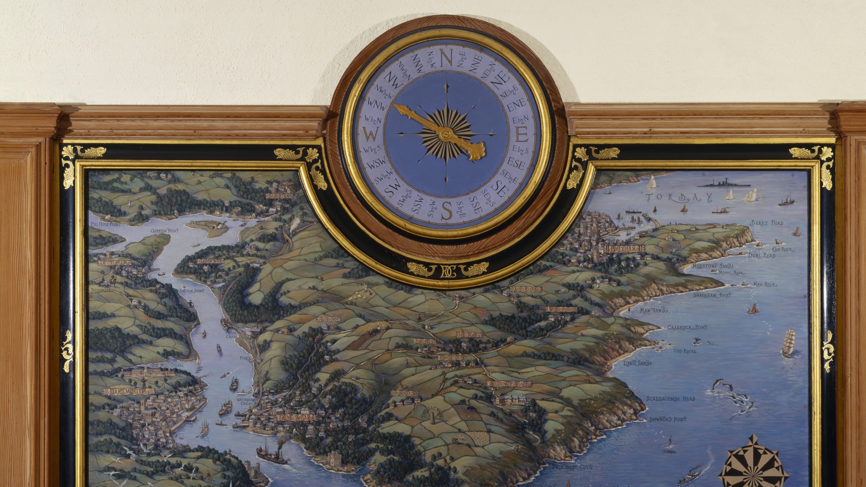 An oil painting on a panel showing a Kingswear Peninsula with a wind dial, found at Coleton Fishacre, Devon