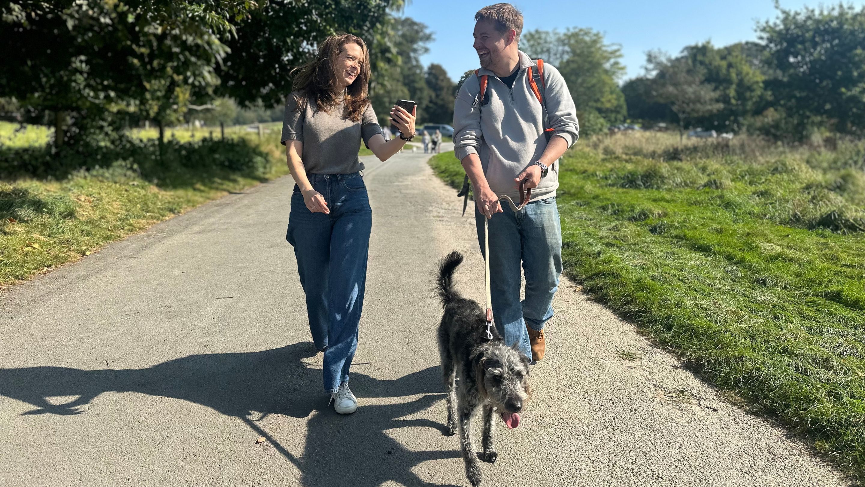A couple using the new HistoryScapes app take a walk along Riverside Walk at Saltram