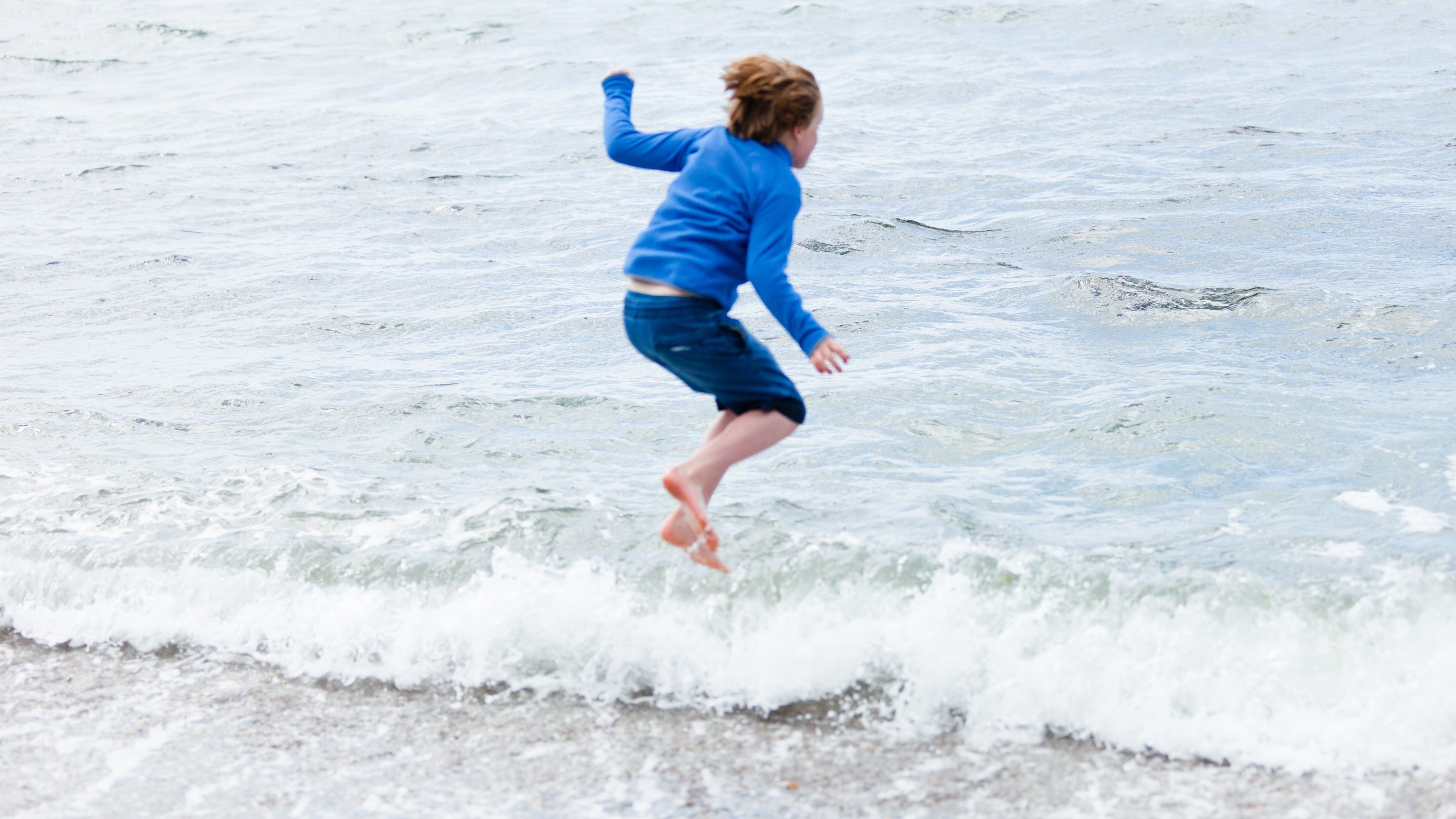 Playing at Wembury Beach, Wembury, Devon.