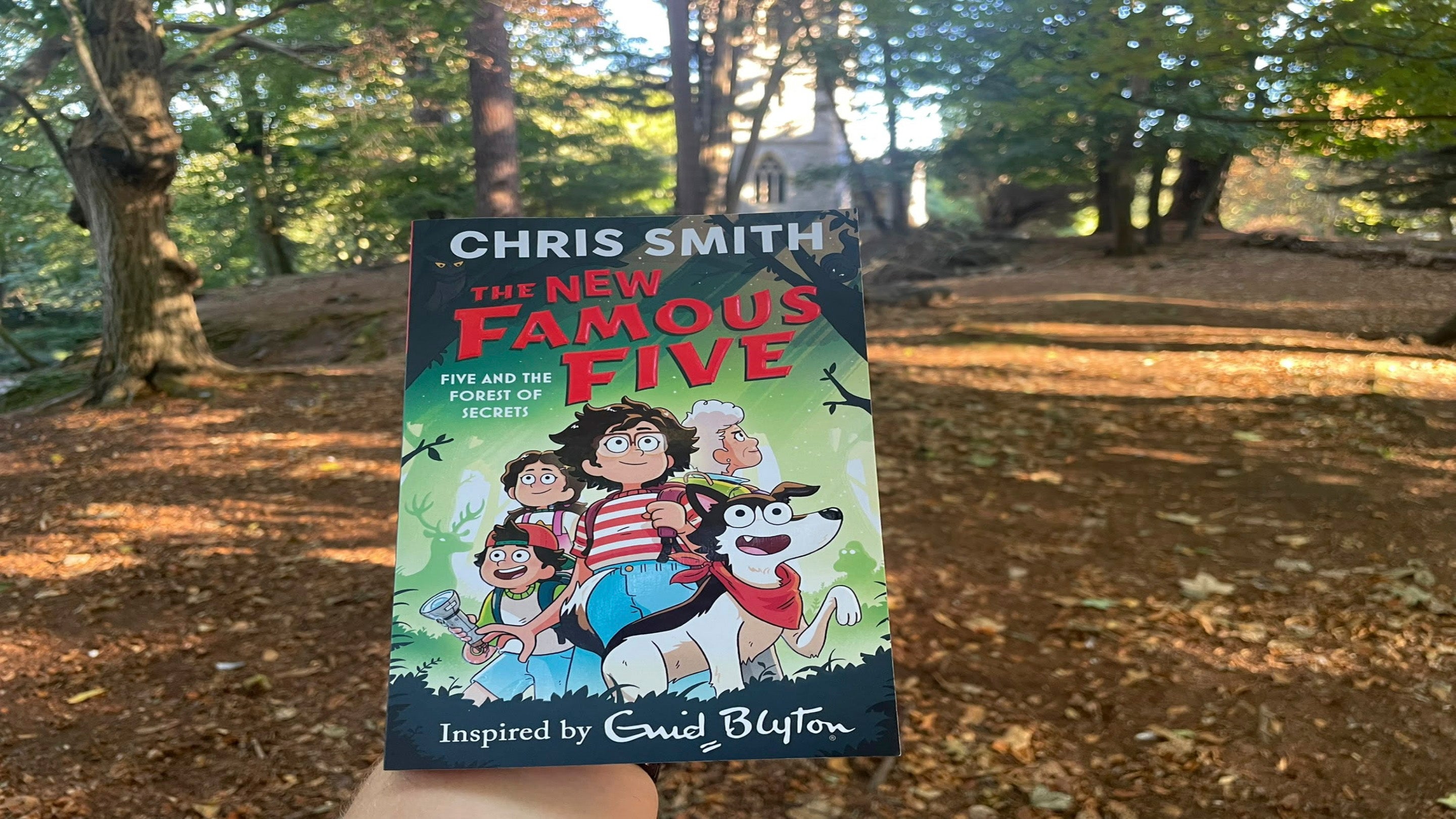 A copy of the Forest of Secrets book in the woods on Brownsea Island.