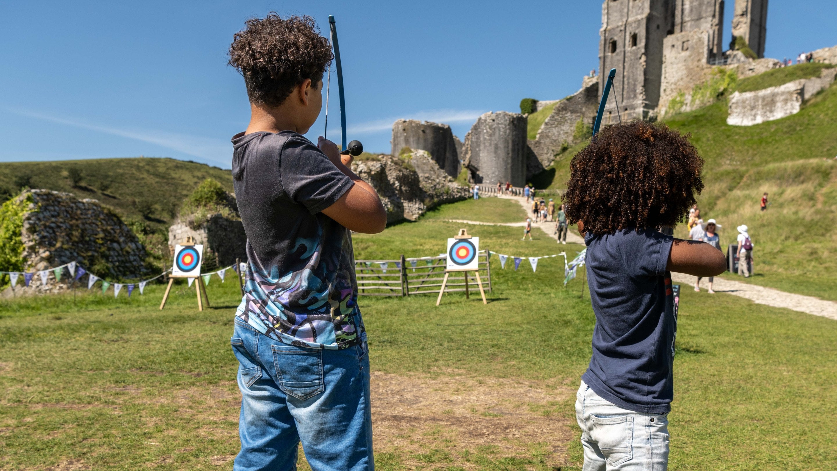 Children playing archery in Corfe Castle