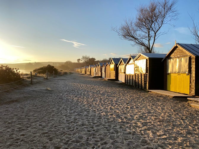 A photo of beach huts at Knoll Beach