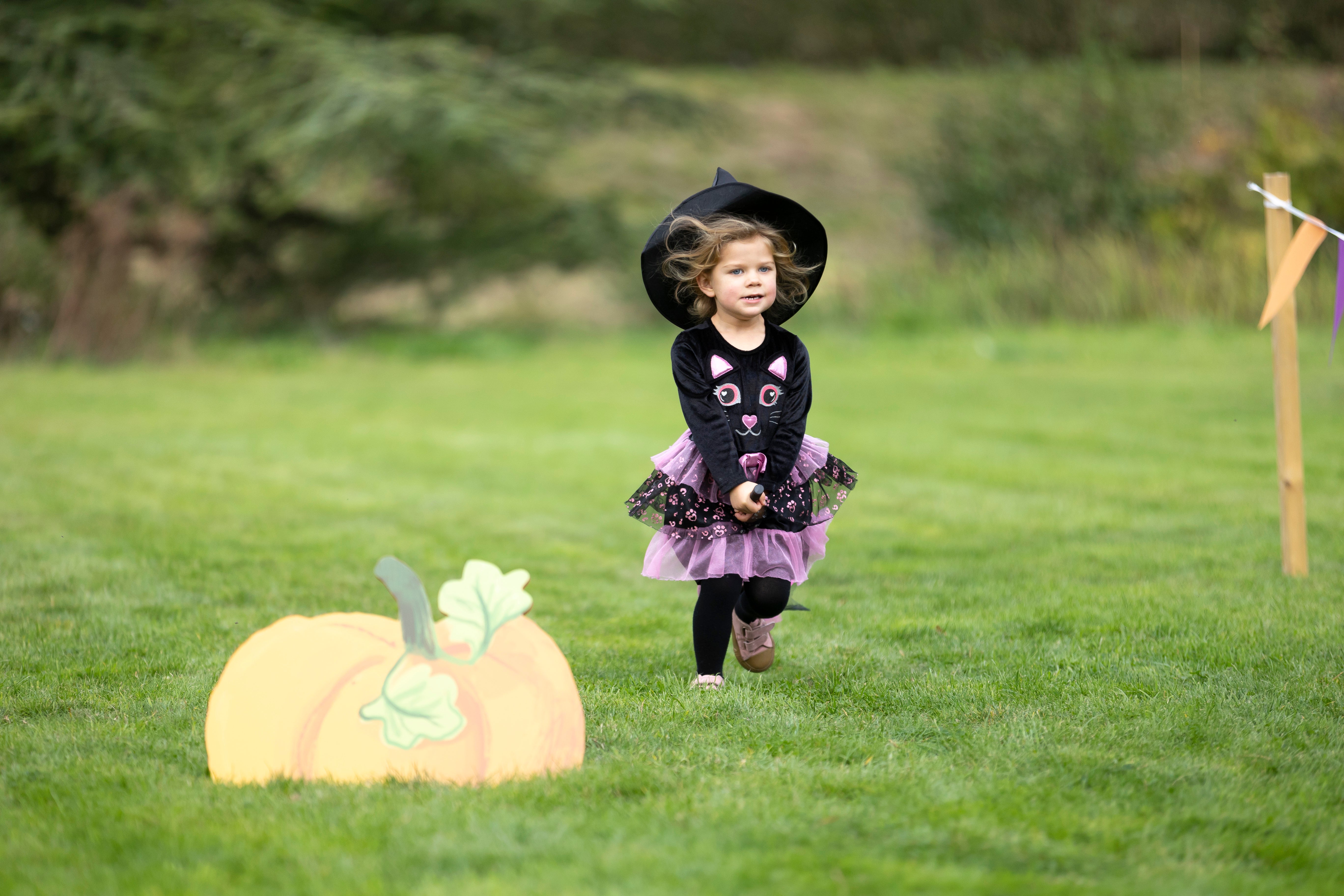 Child exploring the Halloween trail at Ightham Mote, Kent