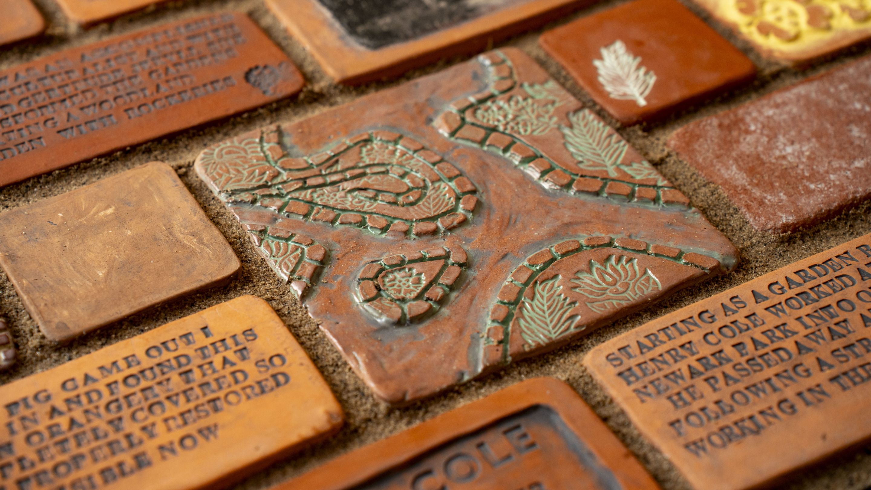Close up of engraved terracotta tiles