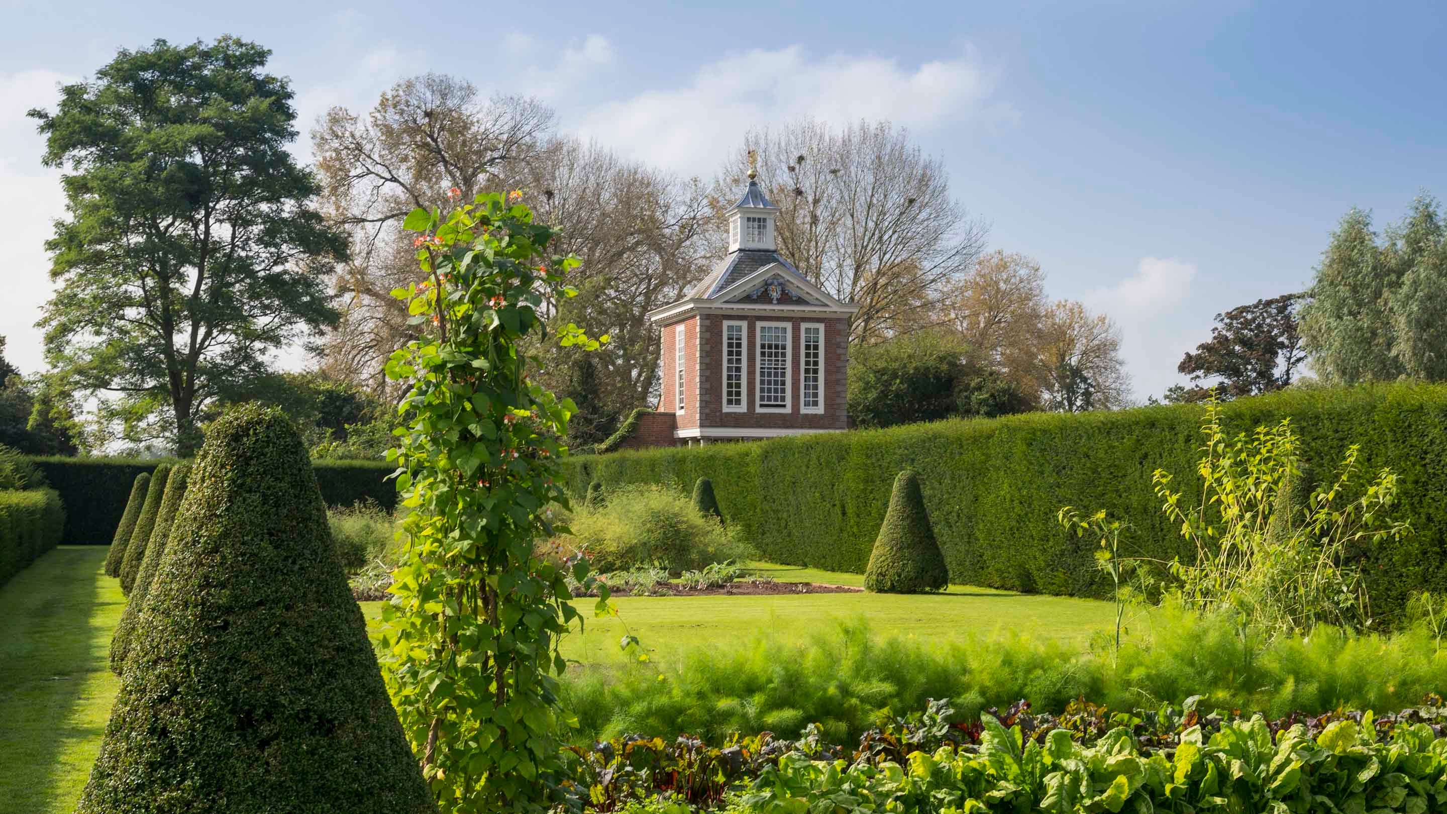 A view of the Tall Pavilion from the vegetable garden at Westbury Court Garden, Gloucestershire
