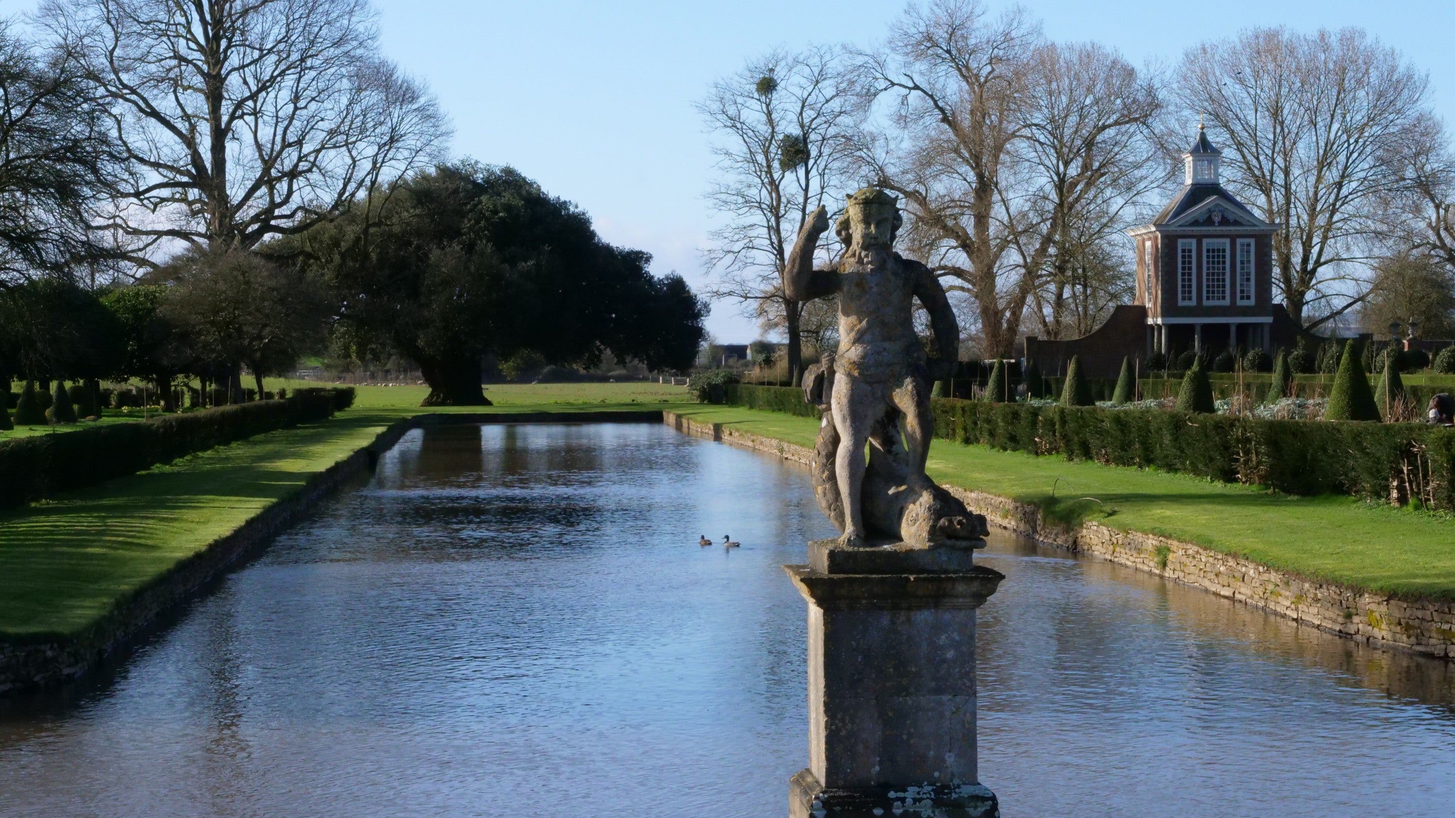 The statue of Neptune and the Tall Pavilion at Westbury Court Garden, Gloucestershire