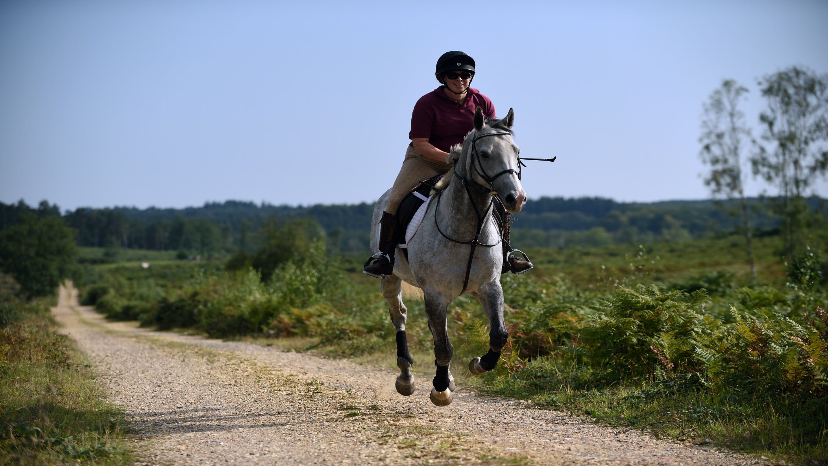 Horse riding in the summer at Foxbury, Hampshire.