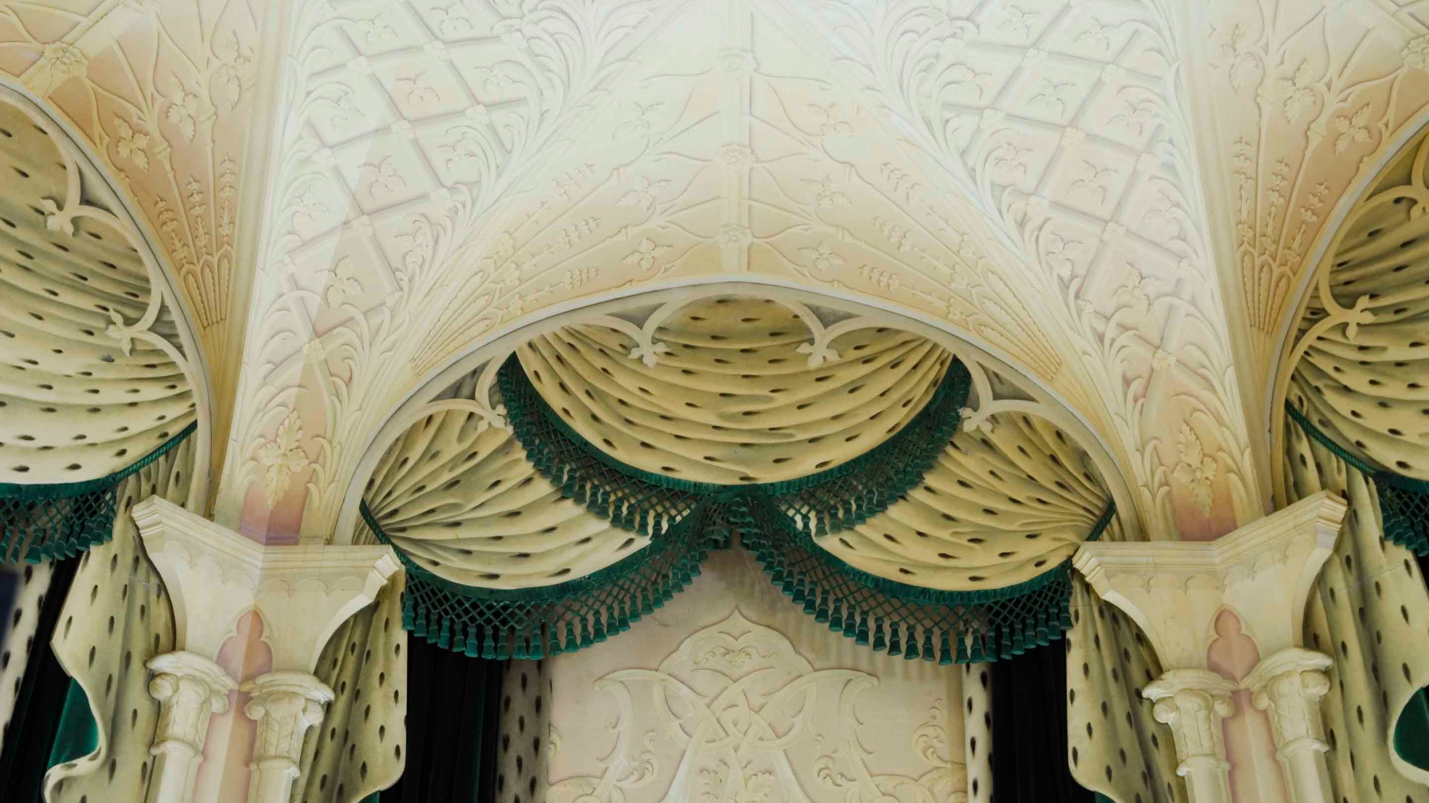The illusionistic vaulted ceiling and pelmets of The Whistler Room, Mottisfont, Hampshire, painted by Rex Whistler in 1938-1939 in trompe-l'oeil trophies, plasterwork and cornice