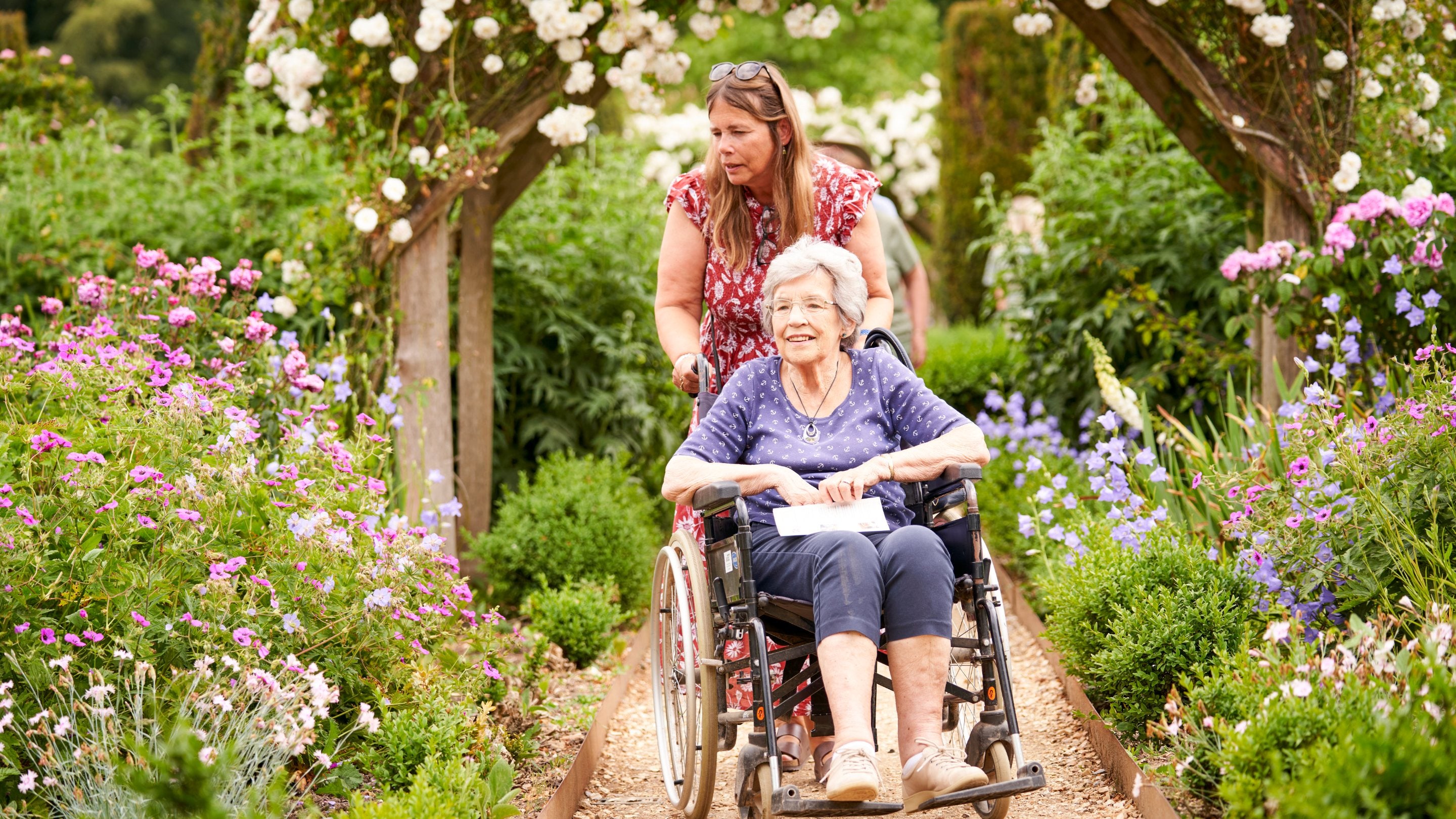 Visitors exploring the garden at Mottisfont, Hampshire