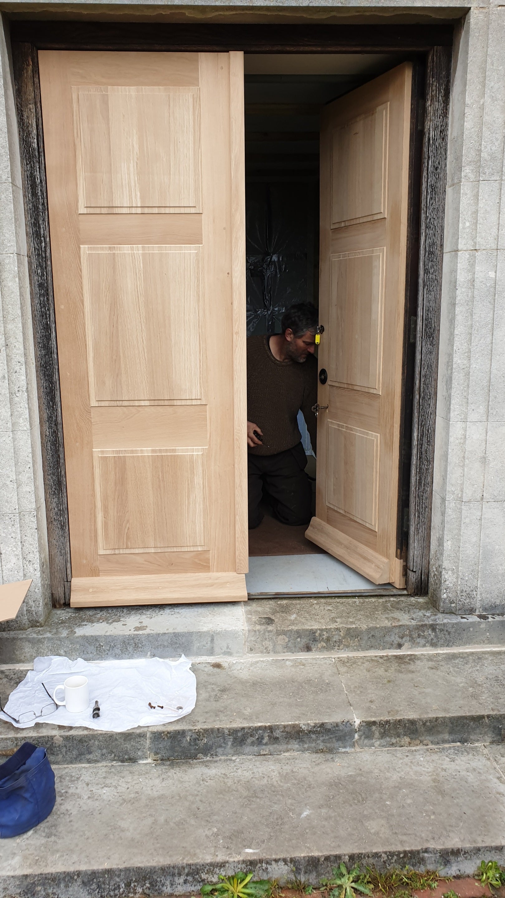 New doors being fitted at Sandham Memorial Chapel