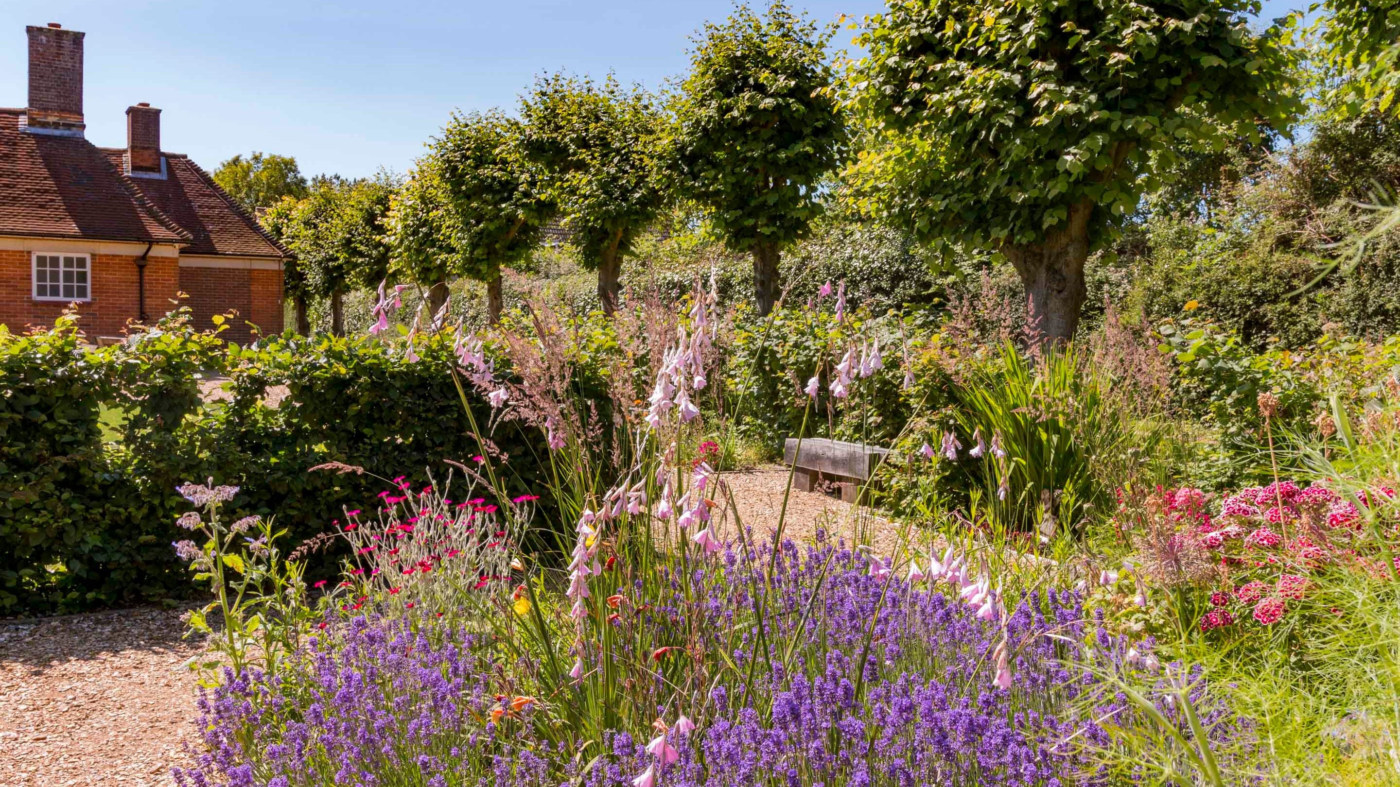 The gardens in summer at Sandham Memorial Chapel, Hampshire