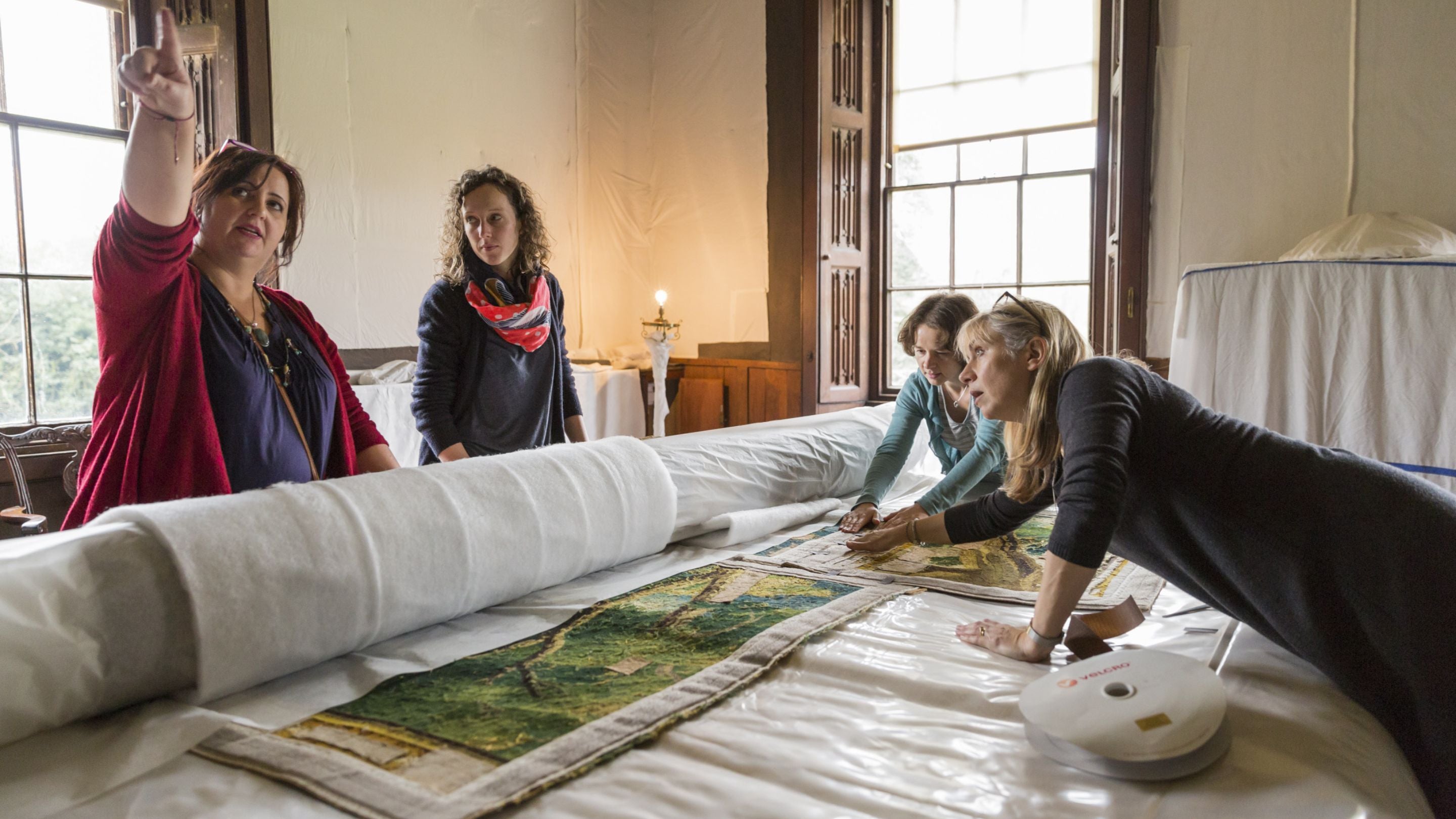Tapestries on the first floor carefully removed and temporarily stored in order to protect them during the roof project at The Vyne, Hampshire