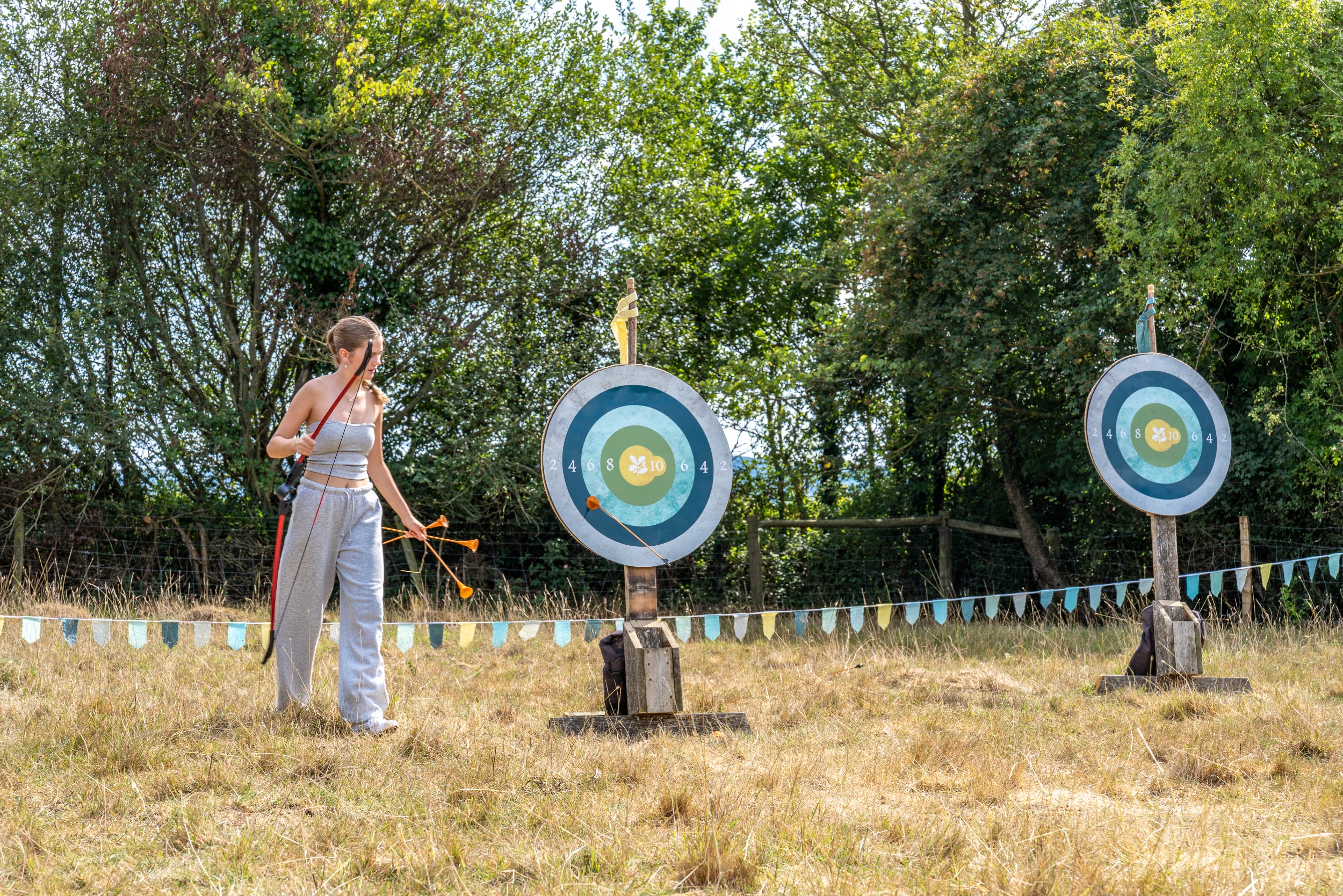 Teenager doing archery at Newtown Medieval Randy-O Fayre