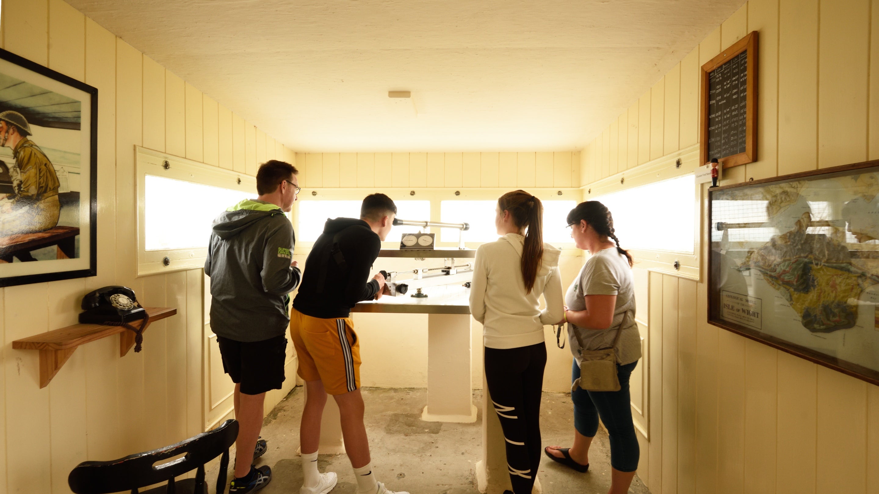 Visitors using the hands-on displays at The Needles Old Battery and New Battery, Isle of Wight