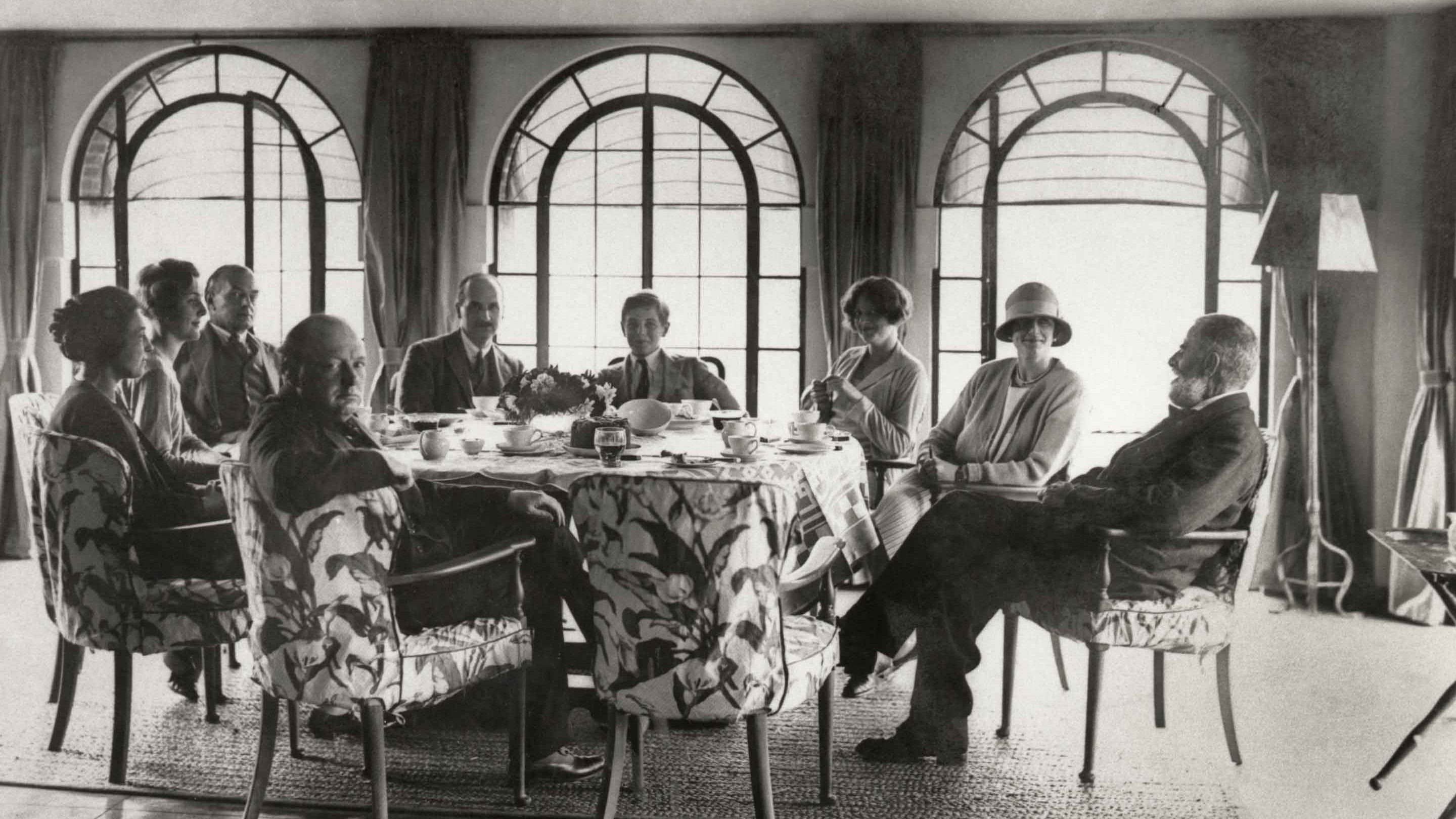 Black and white photo of the Churchills at breakfast in August 1927, at Chartwell, Kent. Photograph by Donald Ferguson, for the painting by Winston Churchill