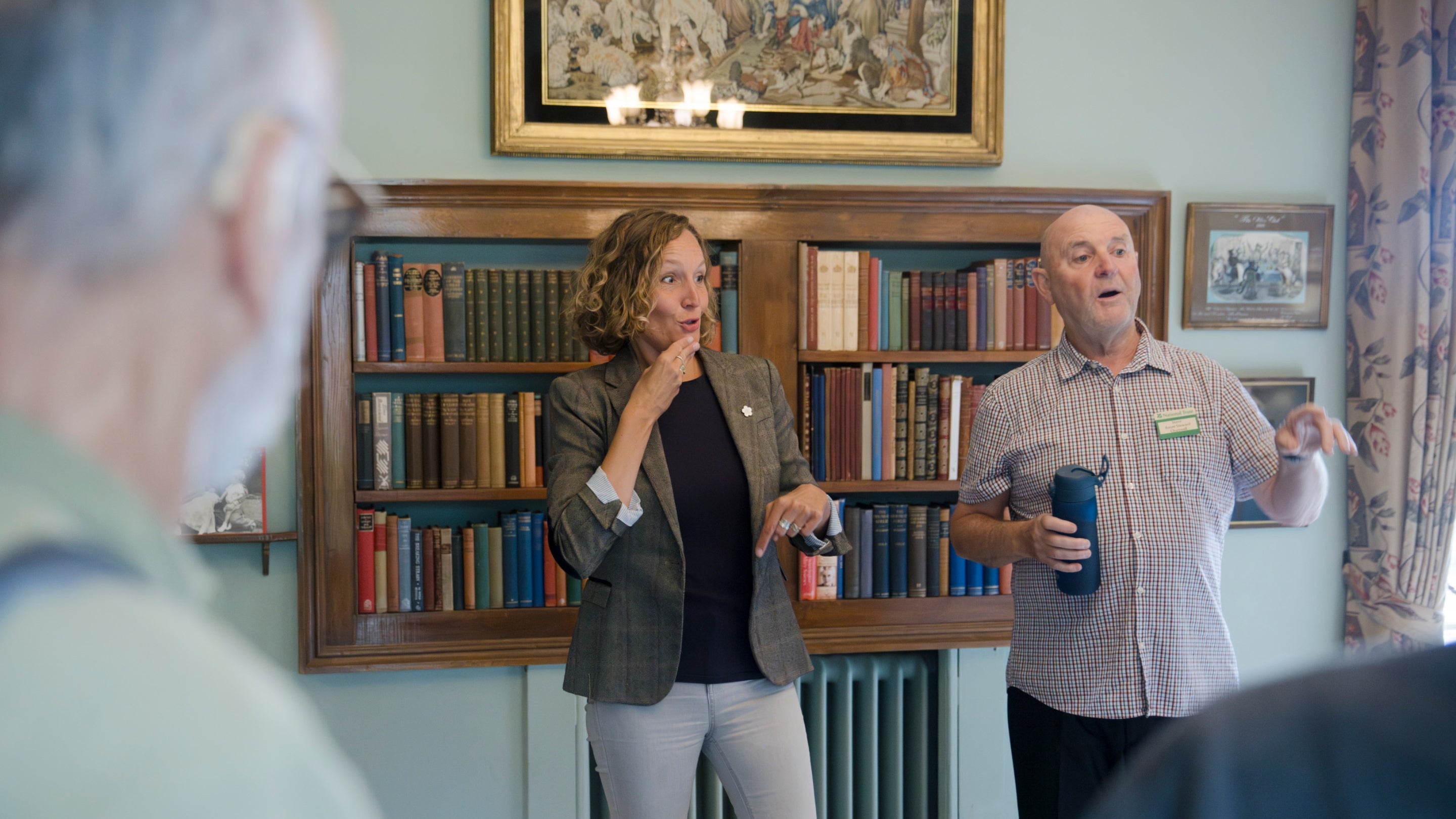 A volunteer guide and a BSL interpreter give a tour of Chartwell, Kent.