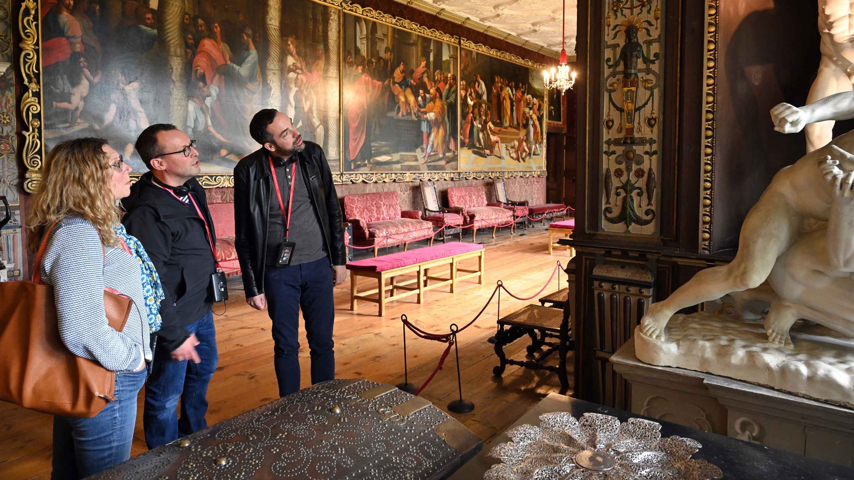 Visitors in the Cartoon Gallery at Knole, Kent