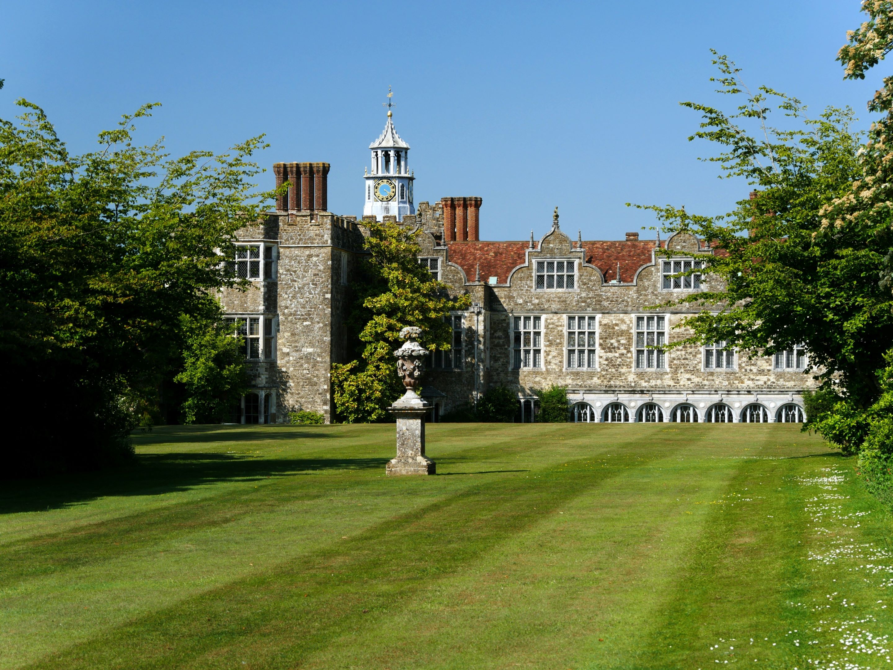 View of historic building and lawn in foreground
