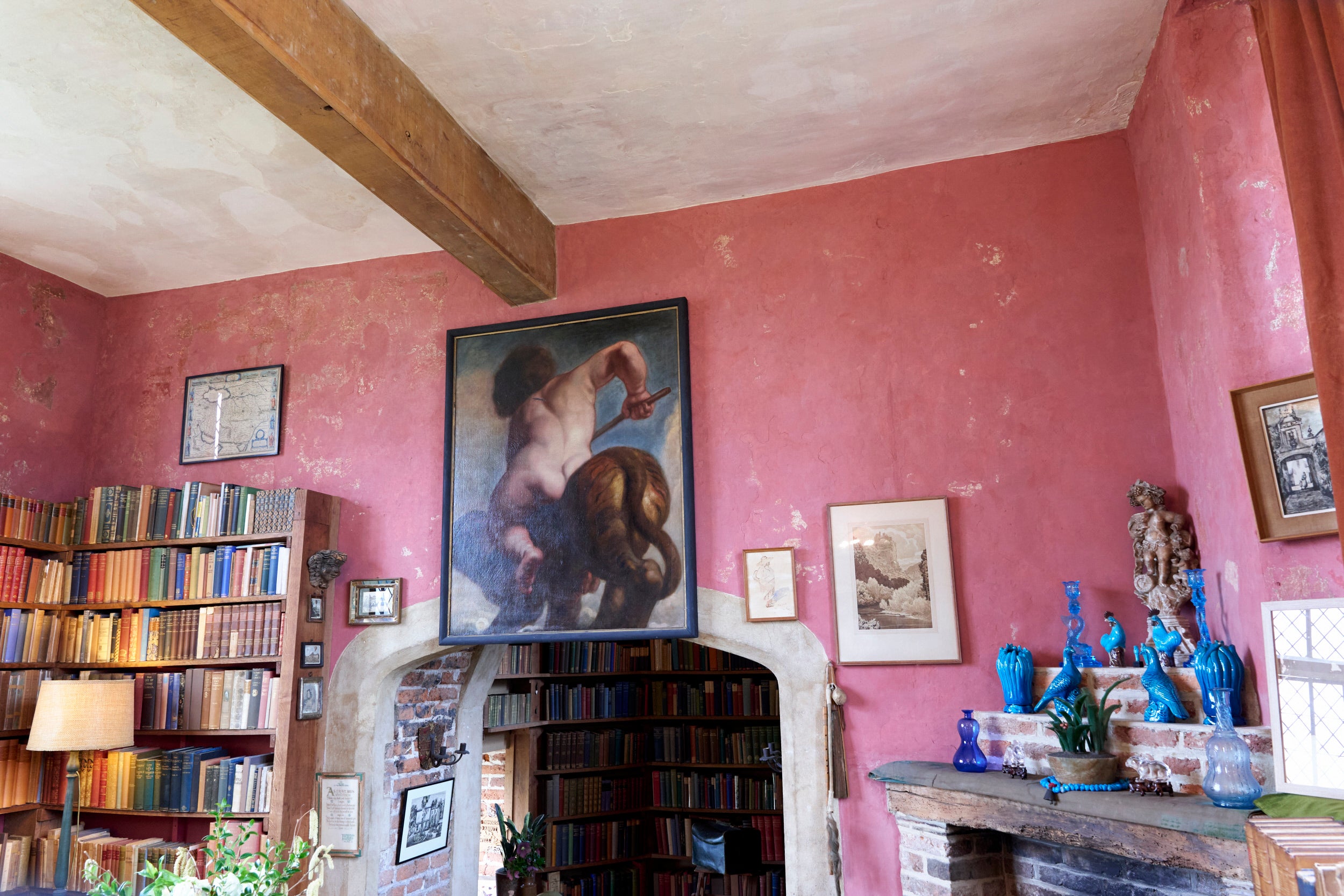 A view of the rosy pink distempered walls in Vita's Writing Room