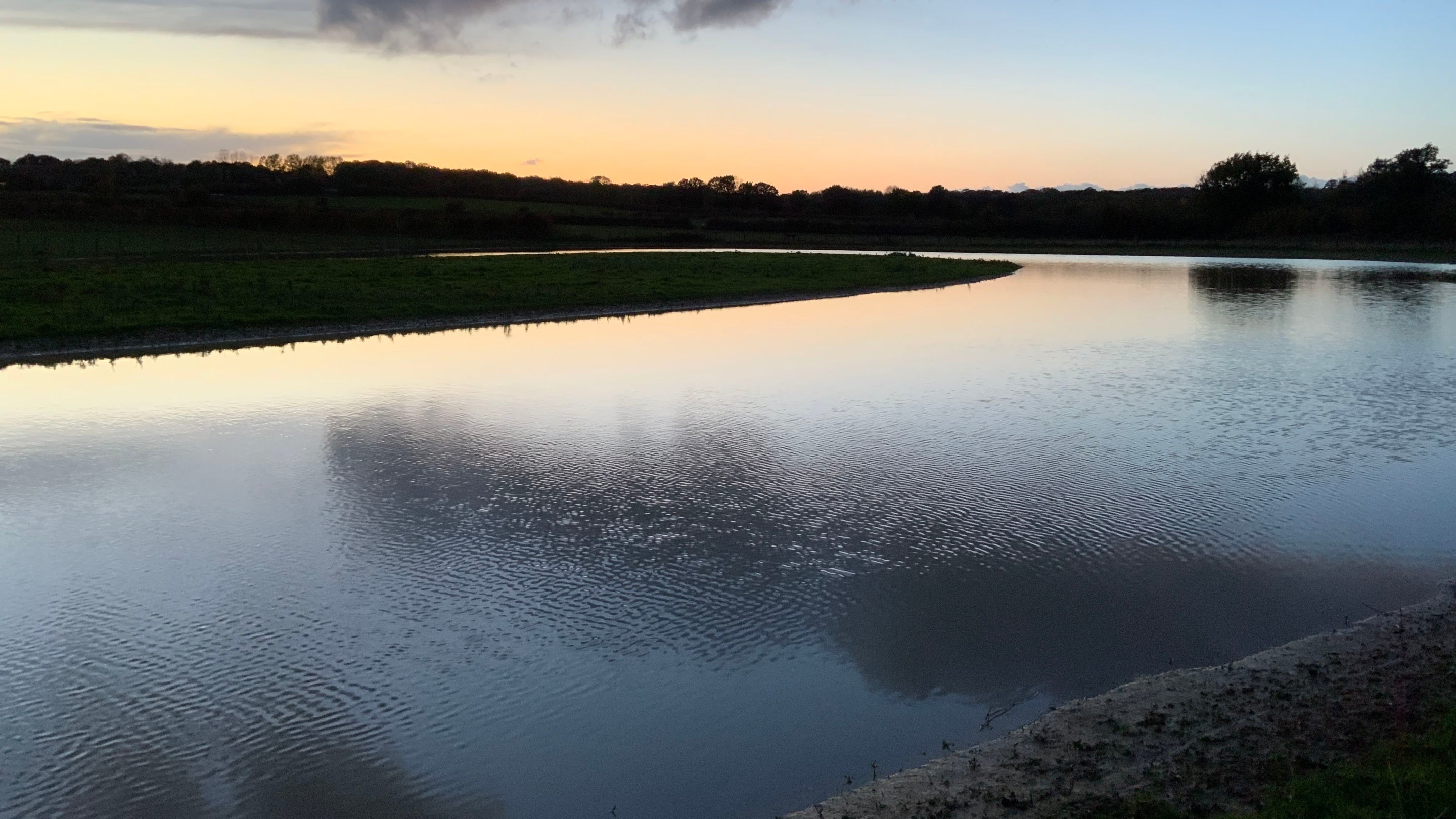 The river flowing through the frog meadow, at Sissinghurst Castle Garden, Kent