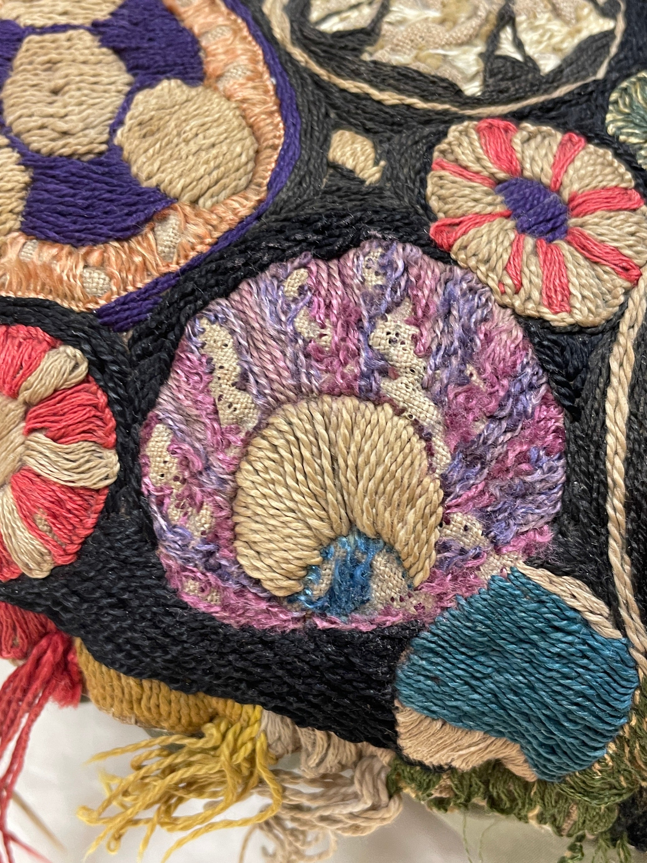 Area of loose embroidery before the netting