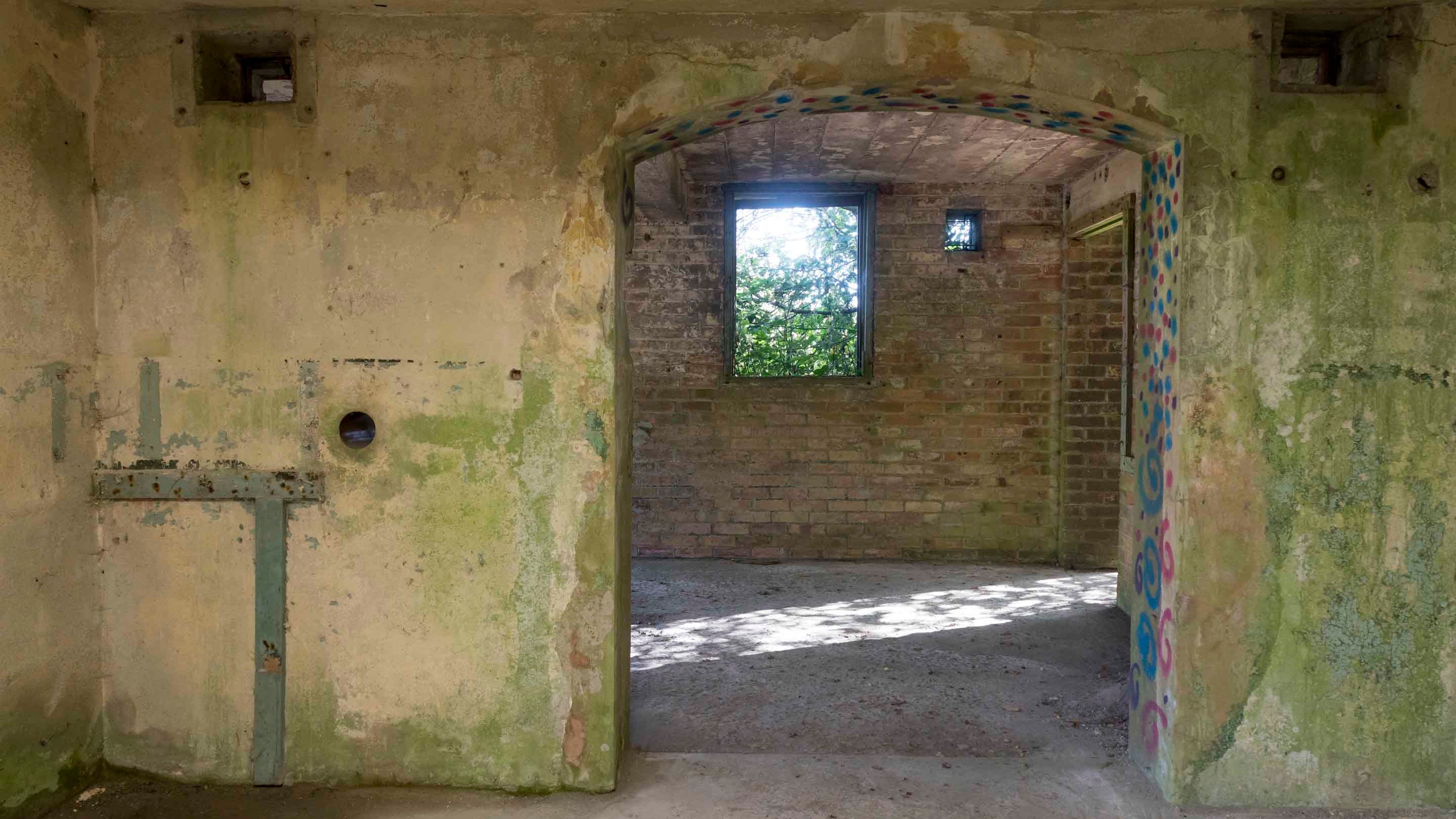 Concrete and brick interior, with a window space, of the Second World War gunnery buildings, near South Foreland Lighthouse, at The White Cliffs of Dover, Kent