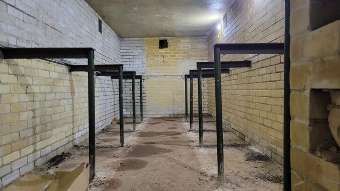 Image of a disused brick underground wartime storeroom used for cordite - the propellant for the Fan Bay shells