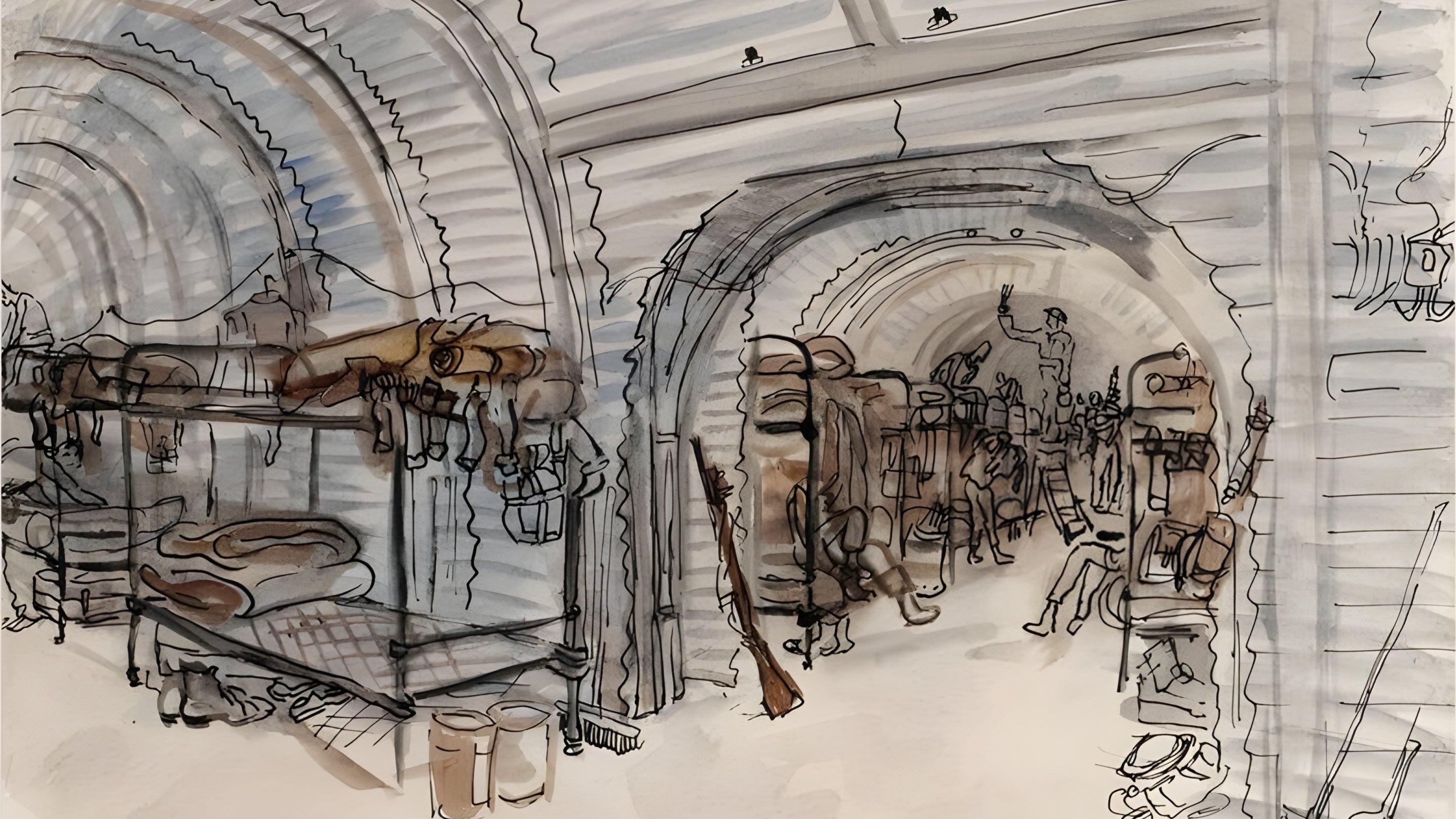 Image of two underground tunnels with bunk beds, bedding and clothing on the beds and a person standing and several seated