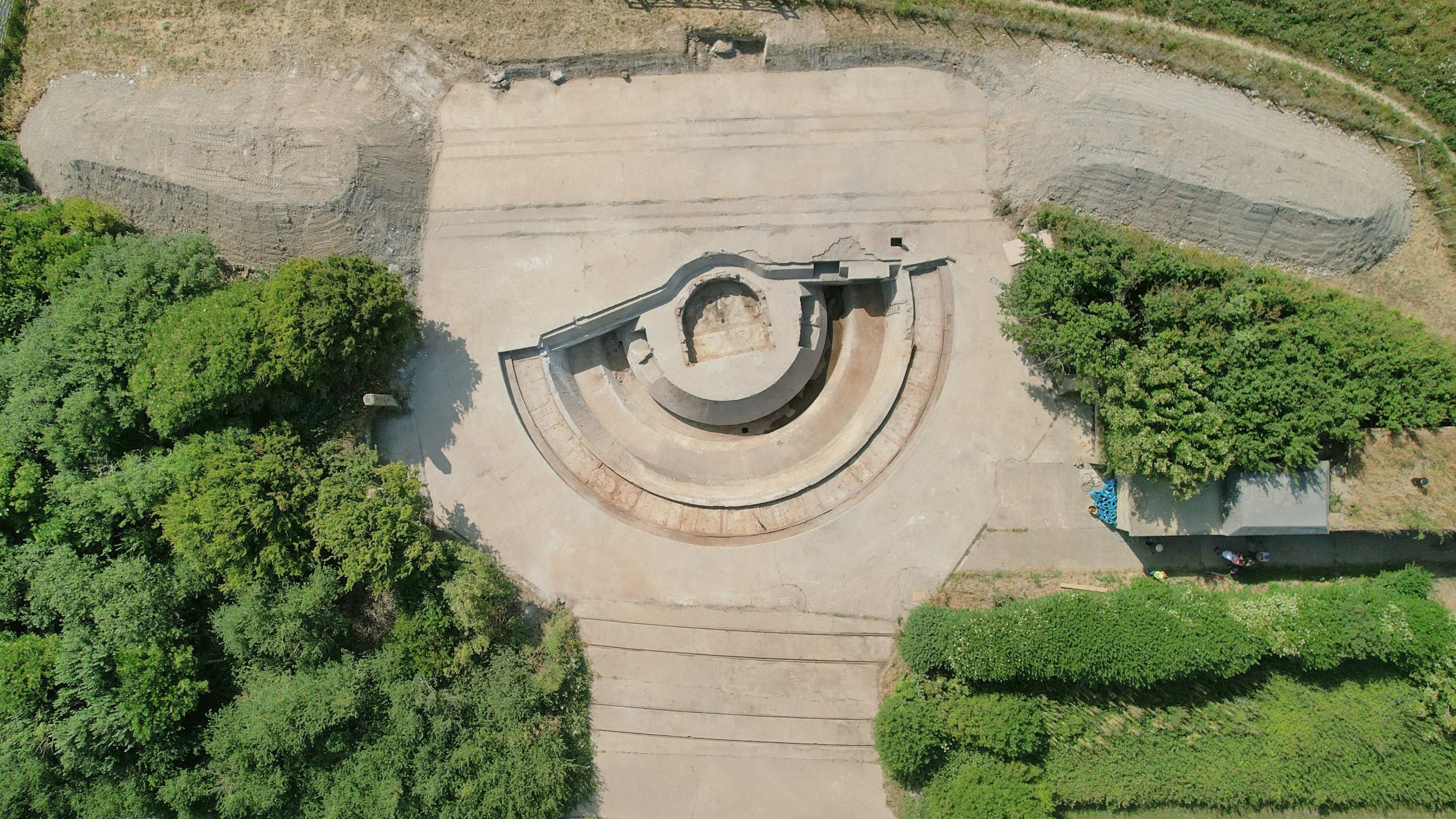 Aerial view of a Second World War concrete gun emplacement on a sunny day