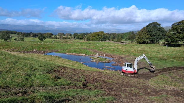 Digger excavating ponds at Common Farm