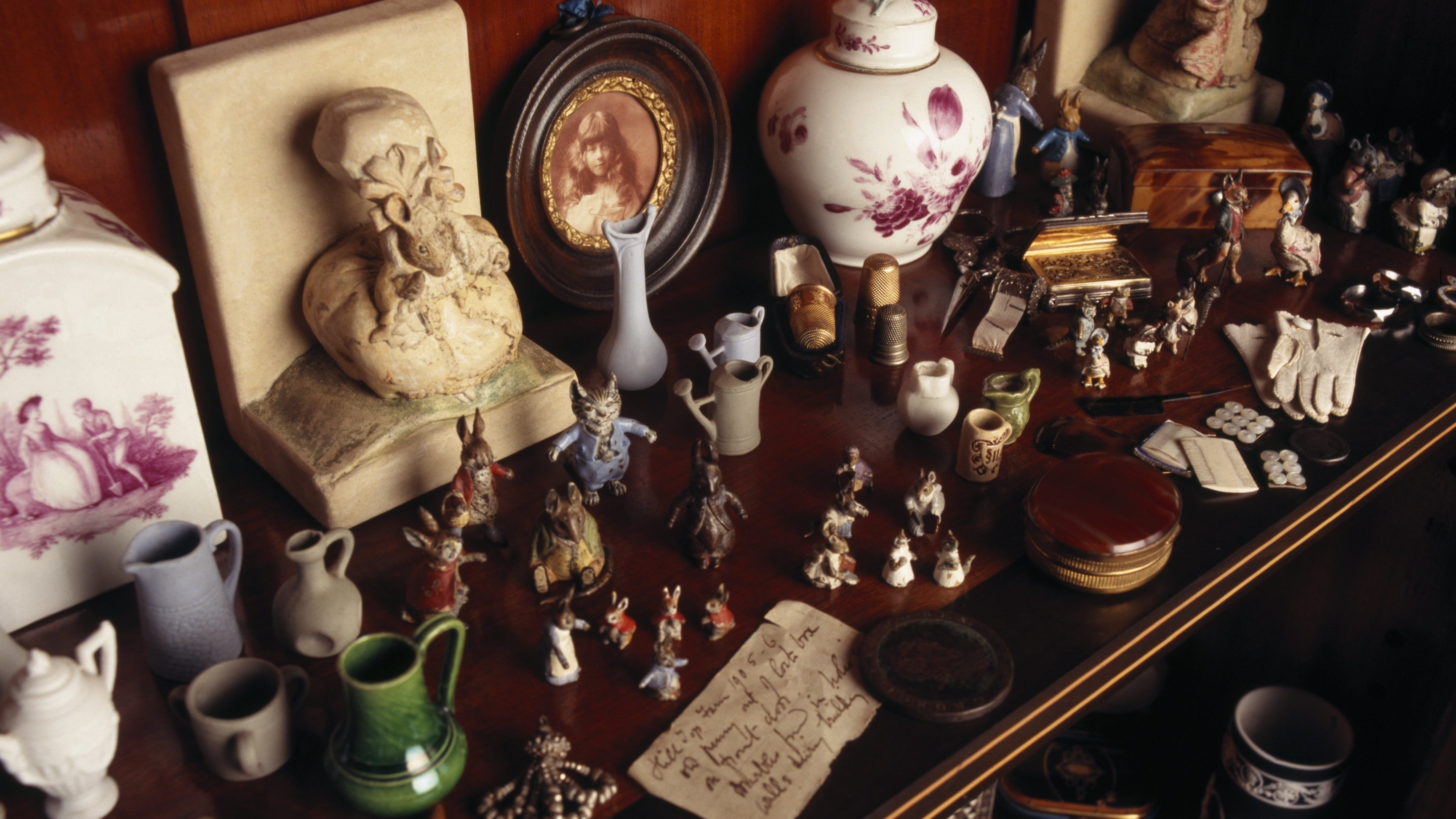 The showcase in the Treasure Room at Hill Top, Sawrey, Cumbria, the home of Beatrix Potter