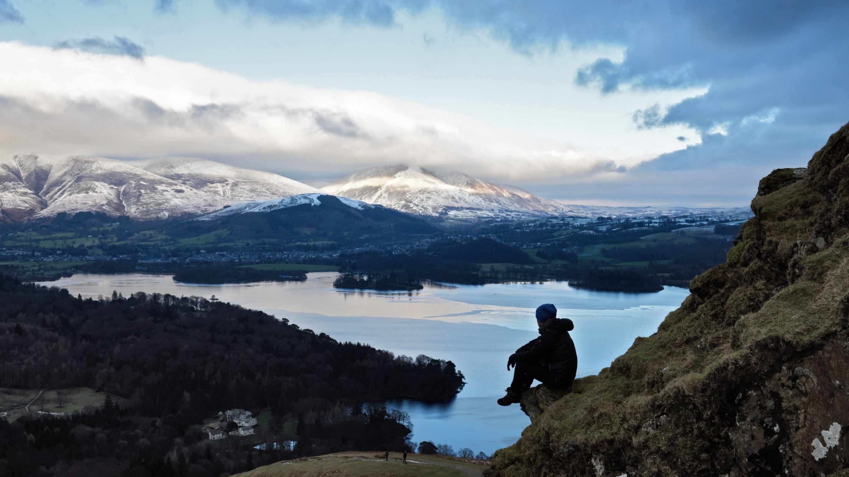 A walker on Cat Bells above Derwent Water in the Lake District