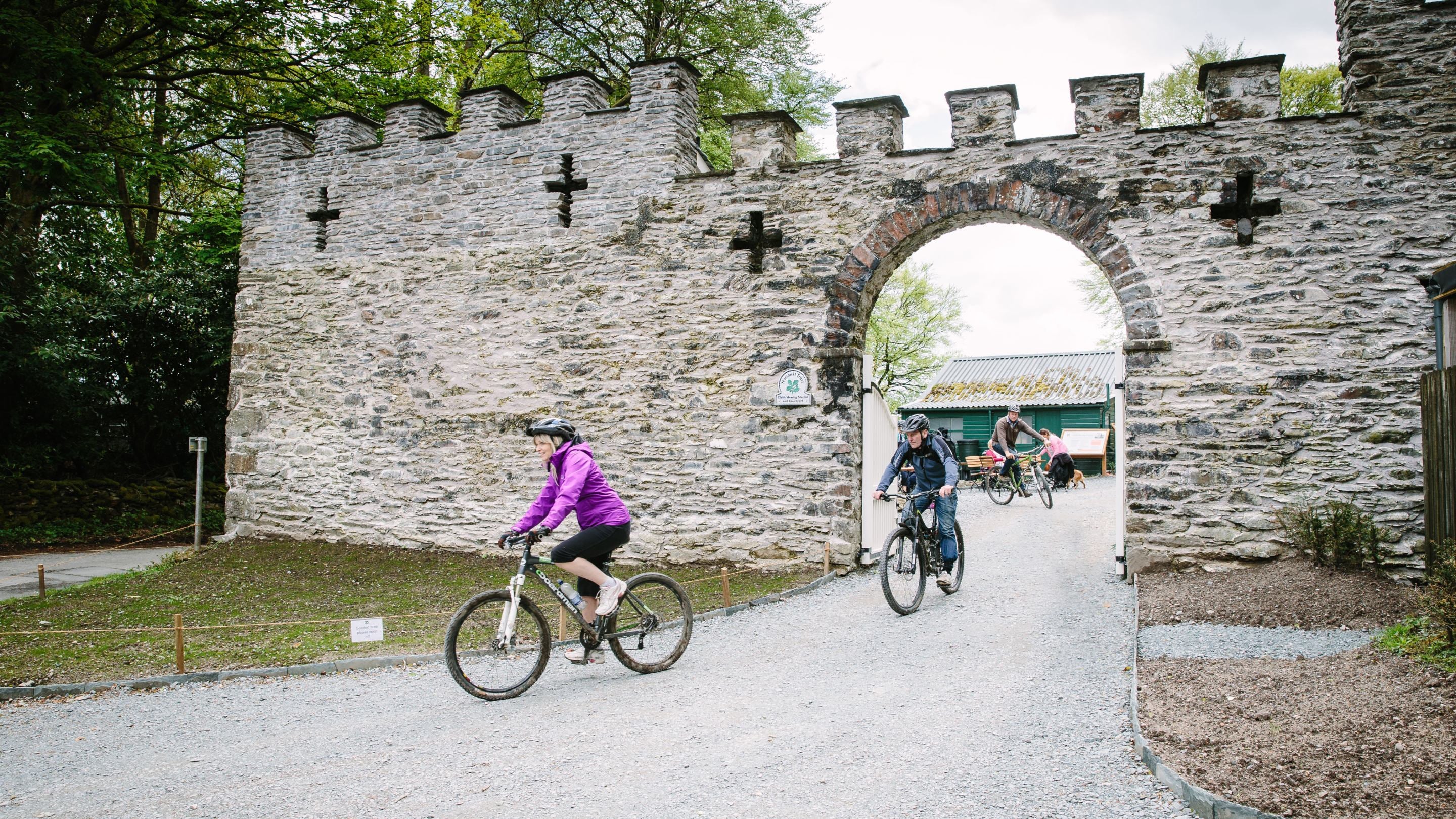 Cyclists in the courtyard at Claife Viewing Station, Cumbria
