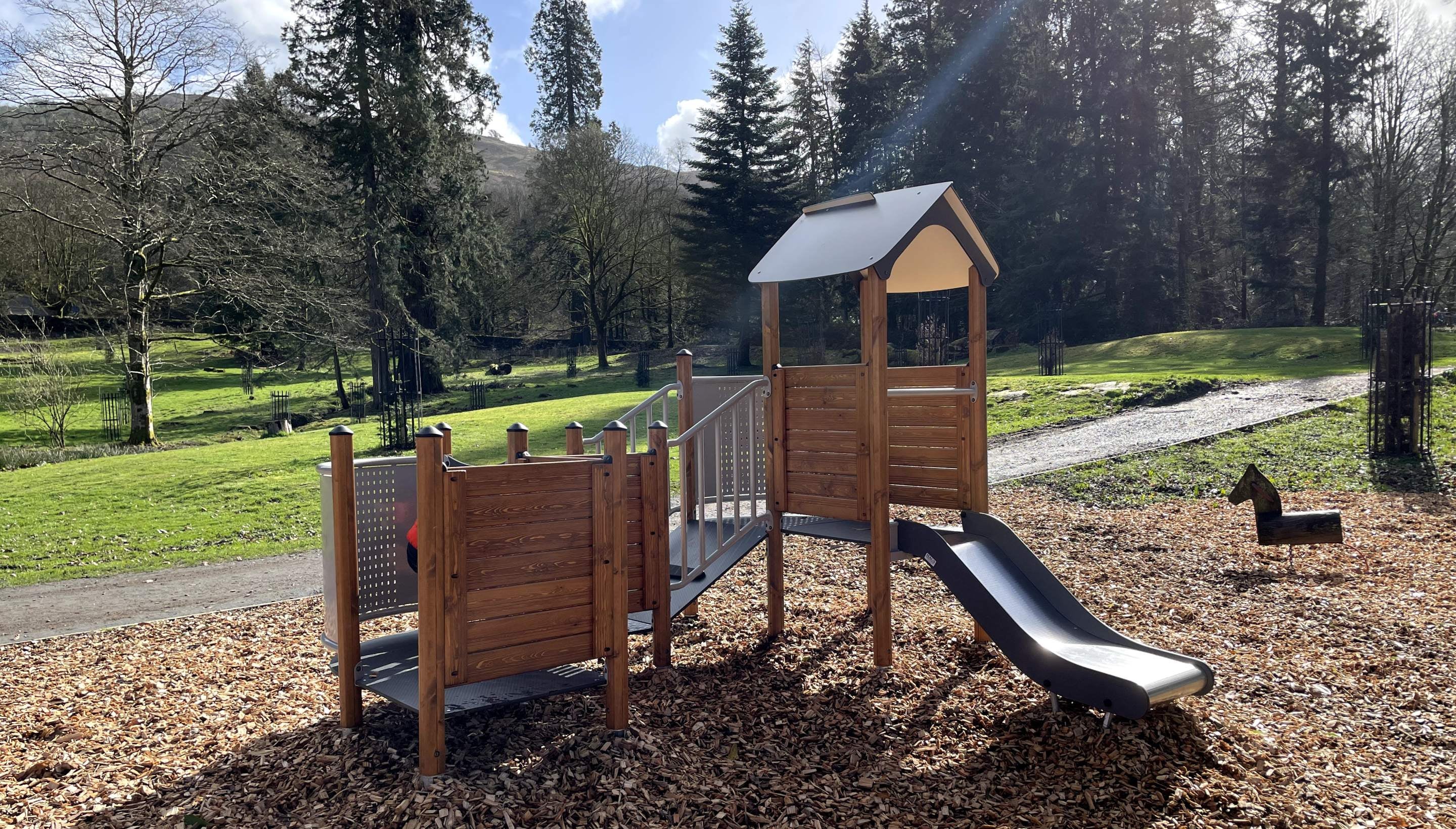 Playhouse and slide at Fell Foot playground