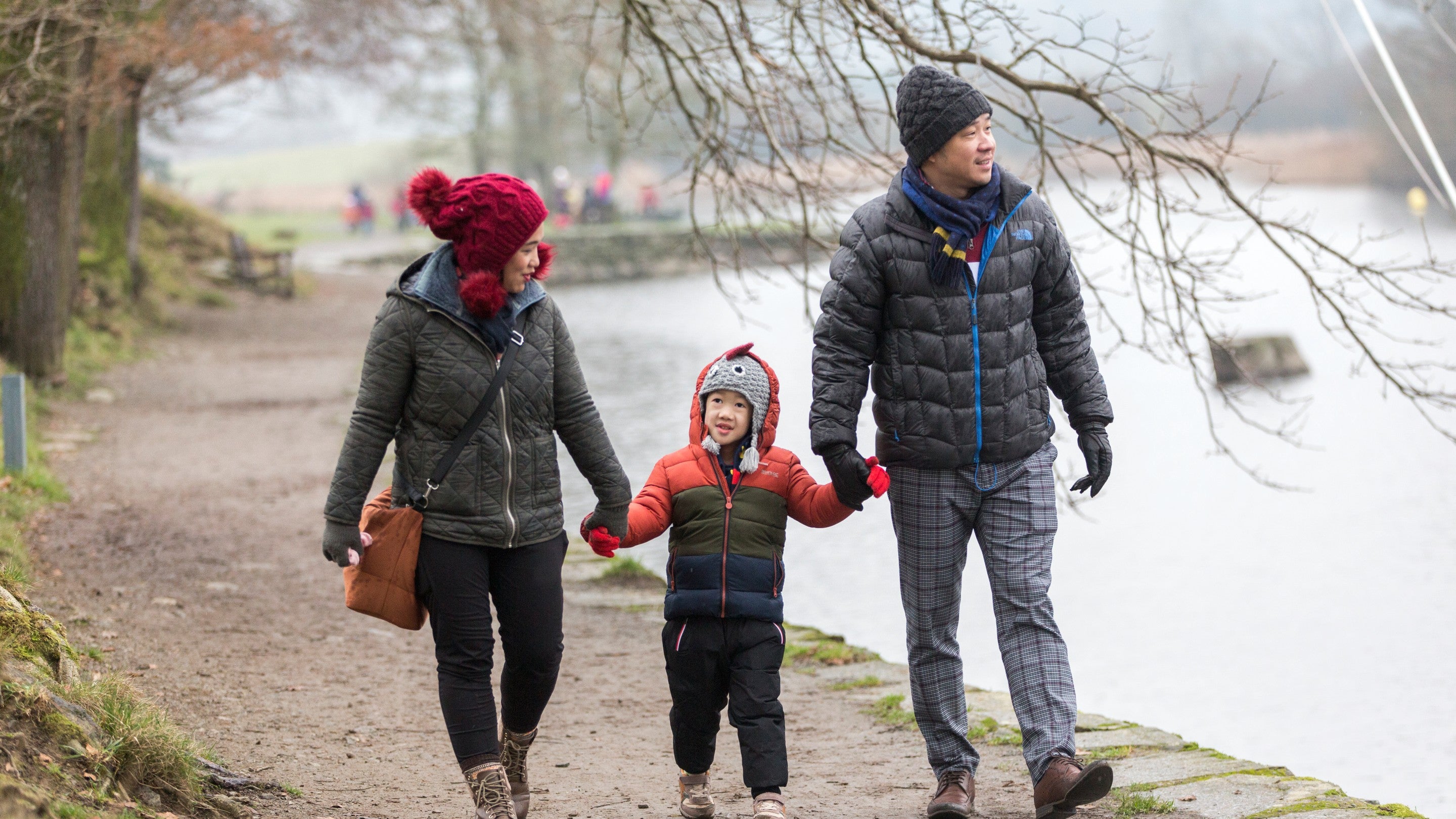 Family walking at Fell Foot in winter, Cumbria