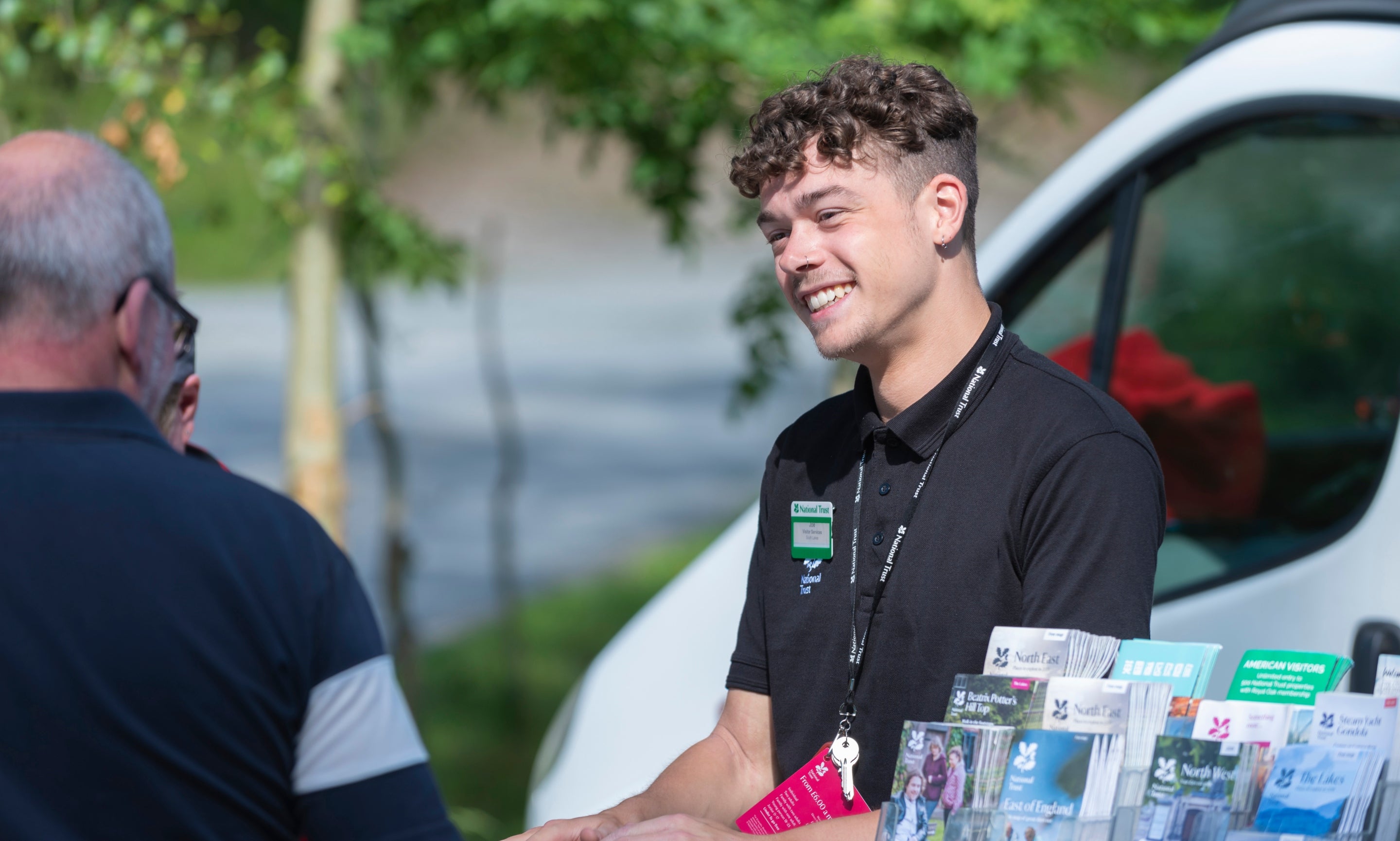 A member of staff at Tarn Hows, Cumbria