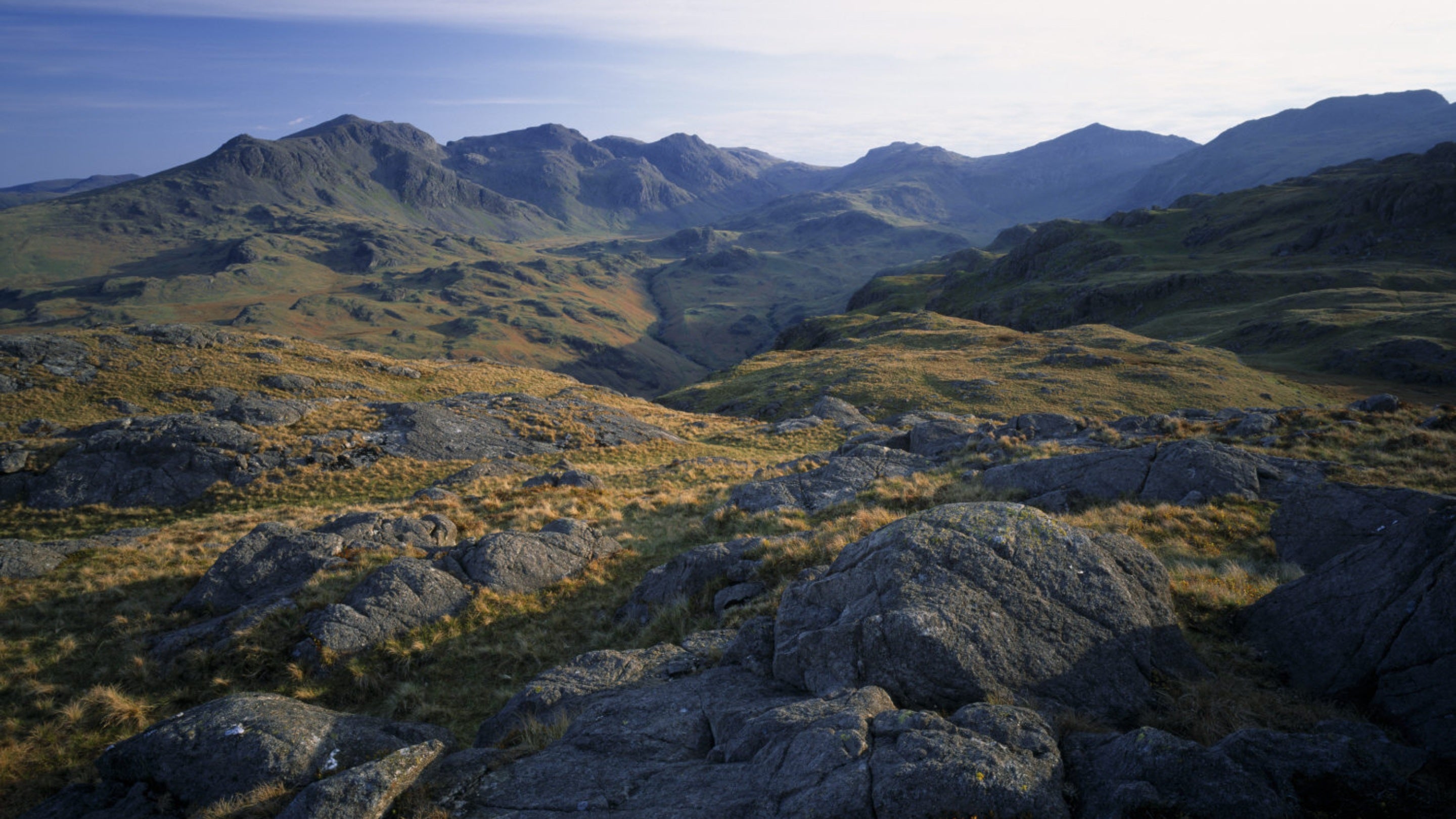 A rugged landscape of mountains in summer