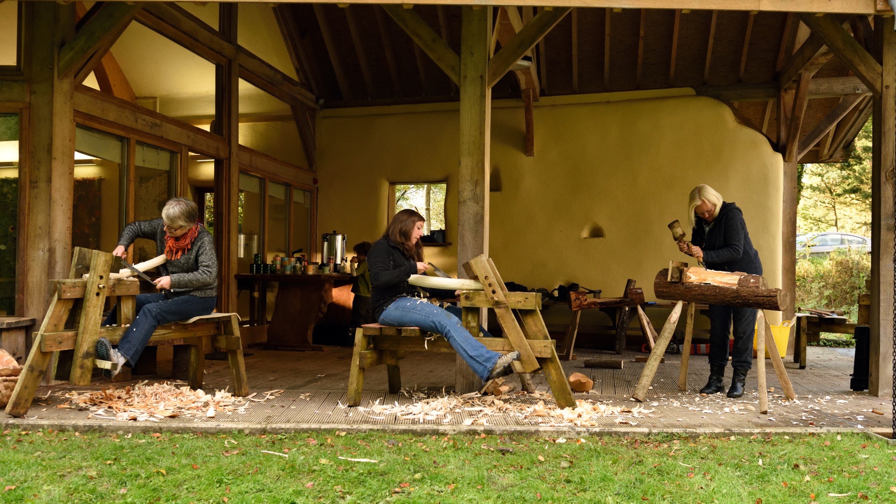 Visitors enjoying woodwork activities at Footprint, Windermere, Cumbria