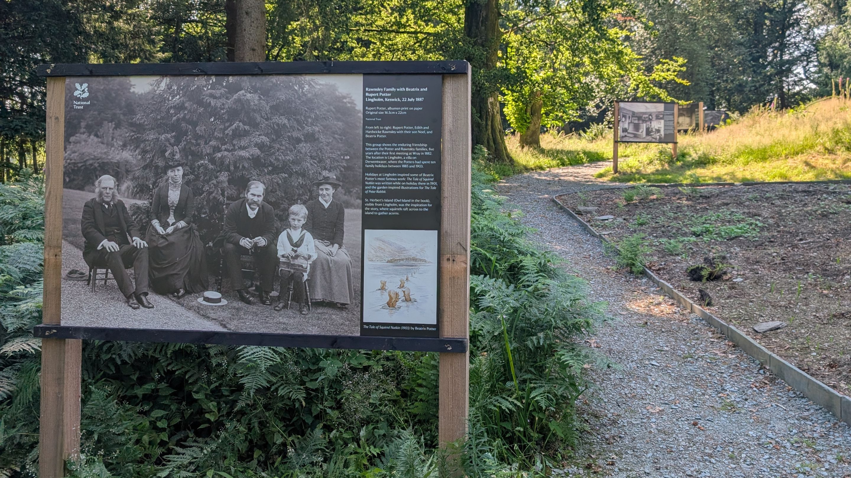 Interpretation panel from the Pages from the Potter Family Album outdoor exhibition at Wray, featuring a large historic black-and-white family photograph.