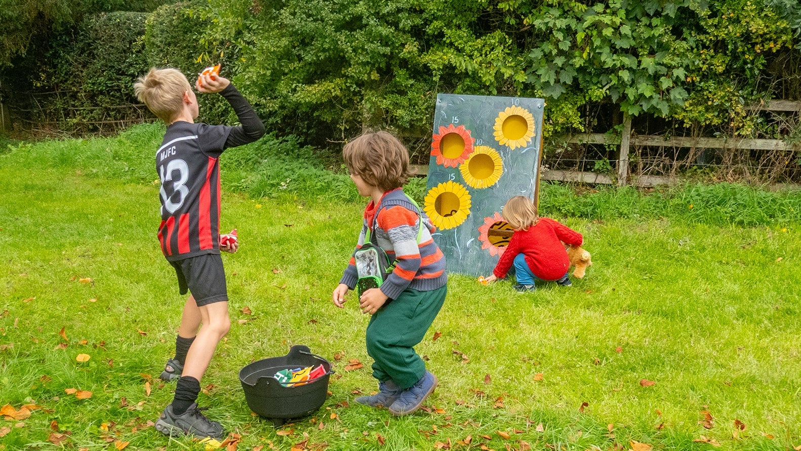 Children enjoying Apple Harvest weekend activities at Canons Ashby, Northamptonshire